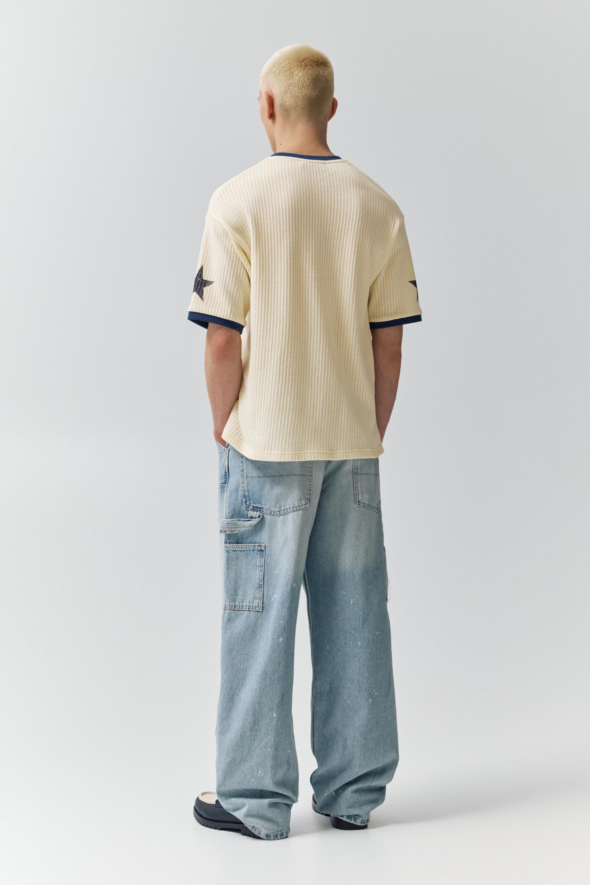 Grafik desenli kısa kollu süveter - Görsel 17