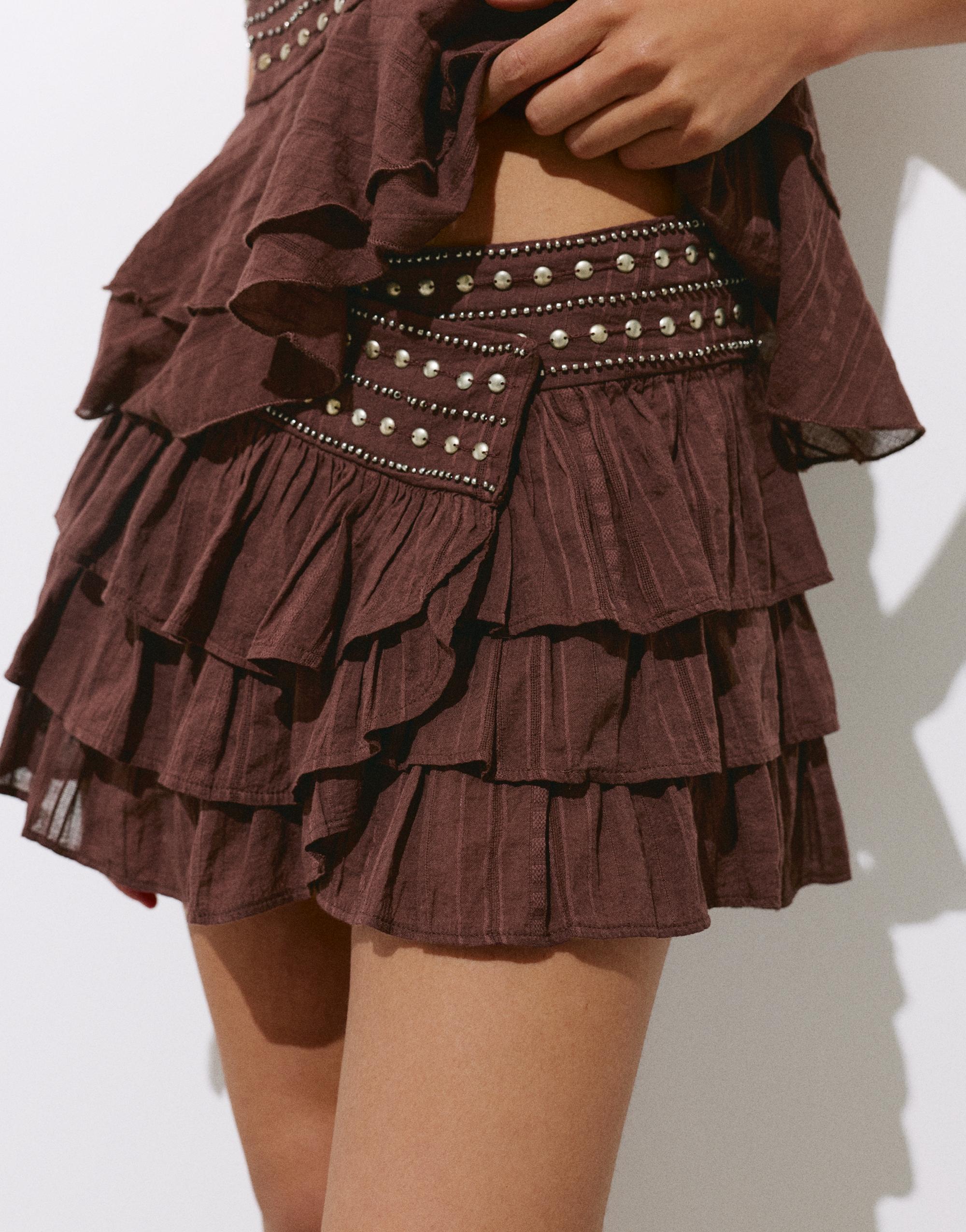 Ruffled mini skirt with studs — Brown