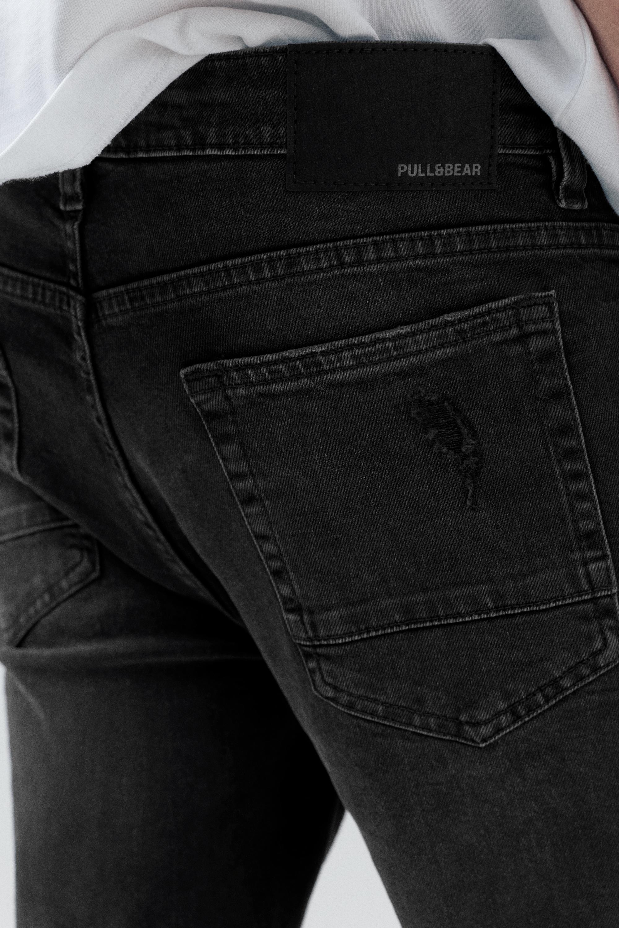 Ripped skinny jeans — Faded black