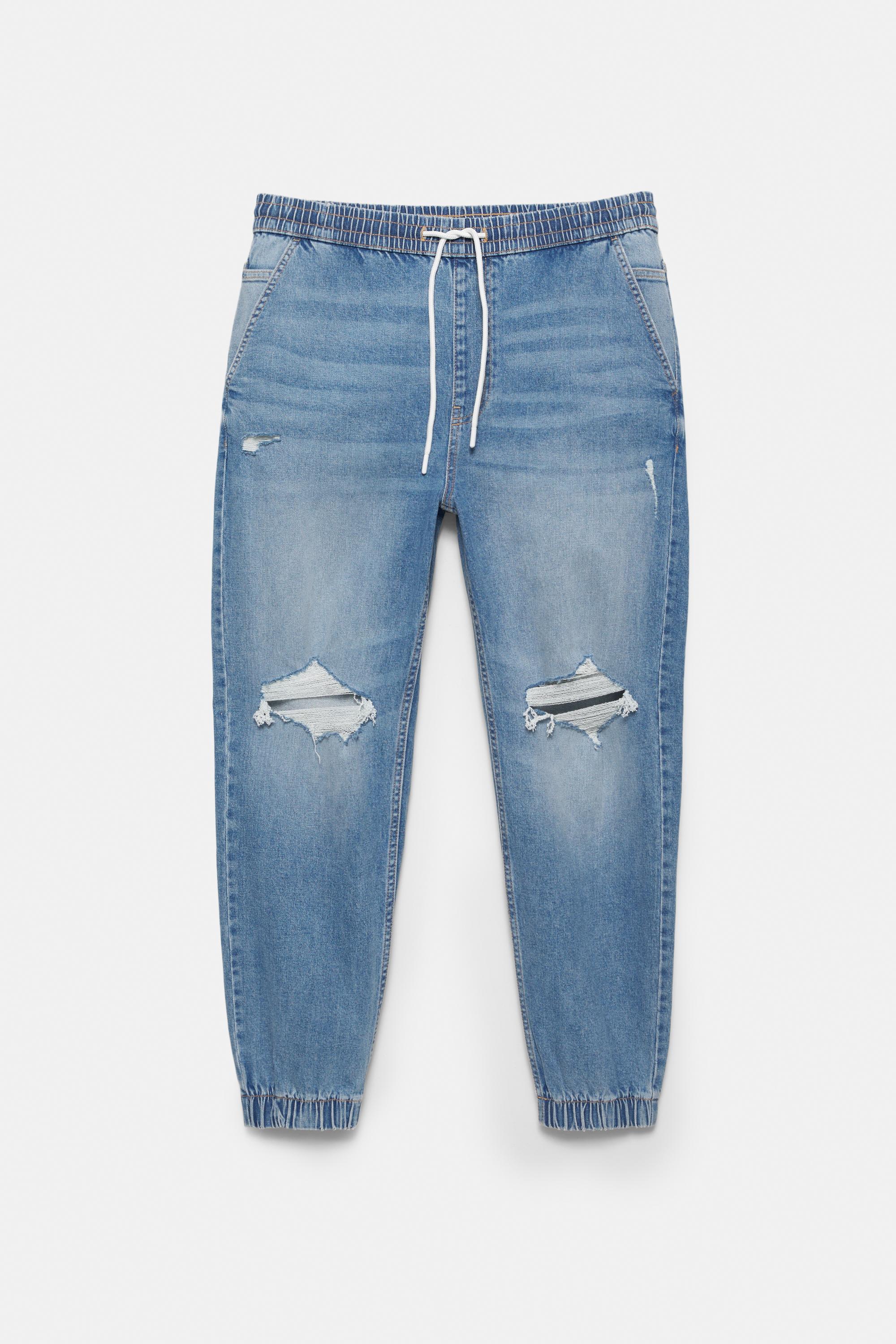 Ripped denim jogger trousers — Pale indigo