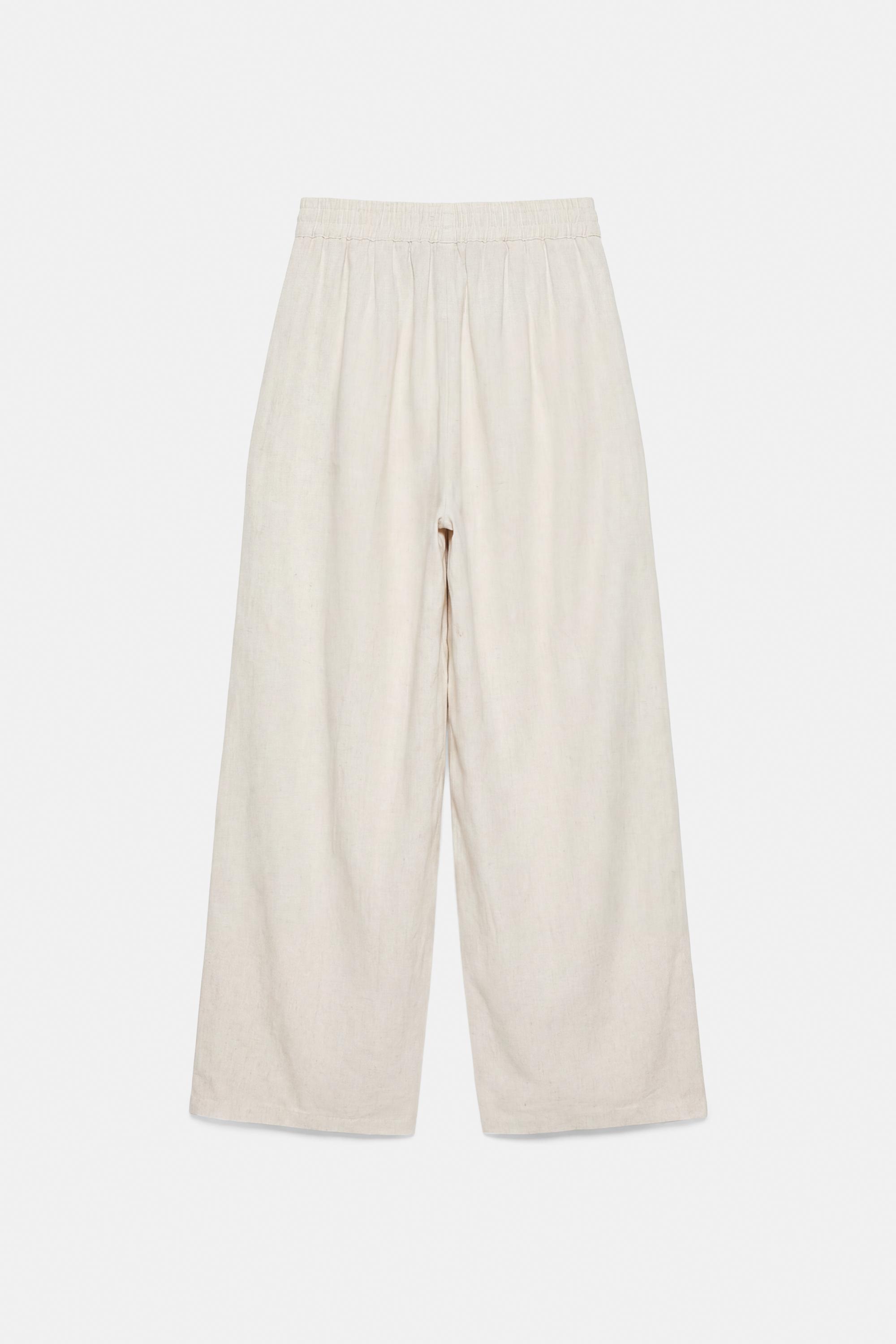 Flowing darted trousers — Sand