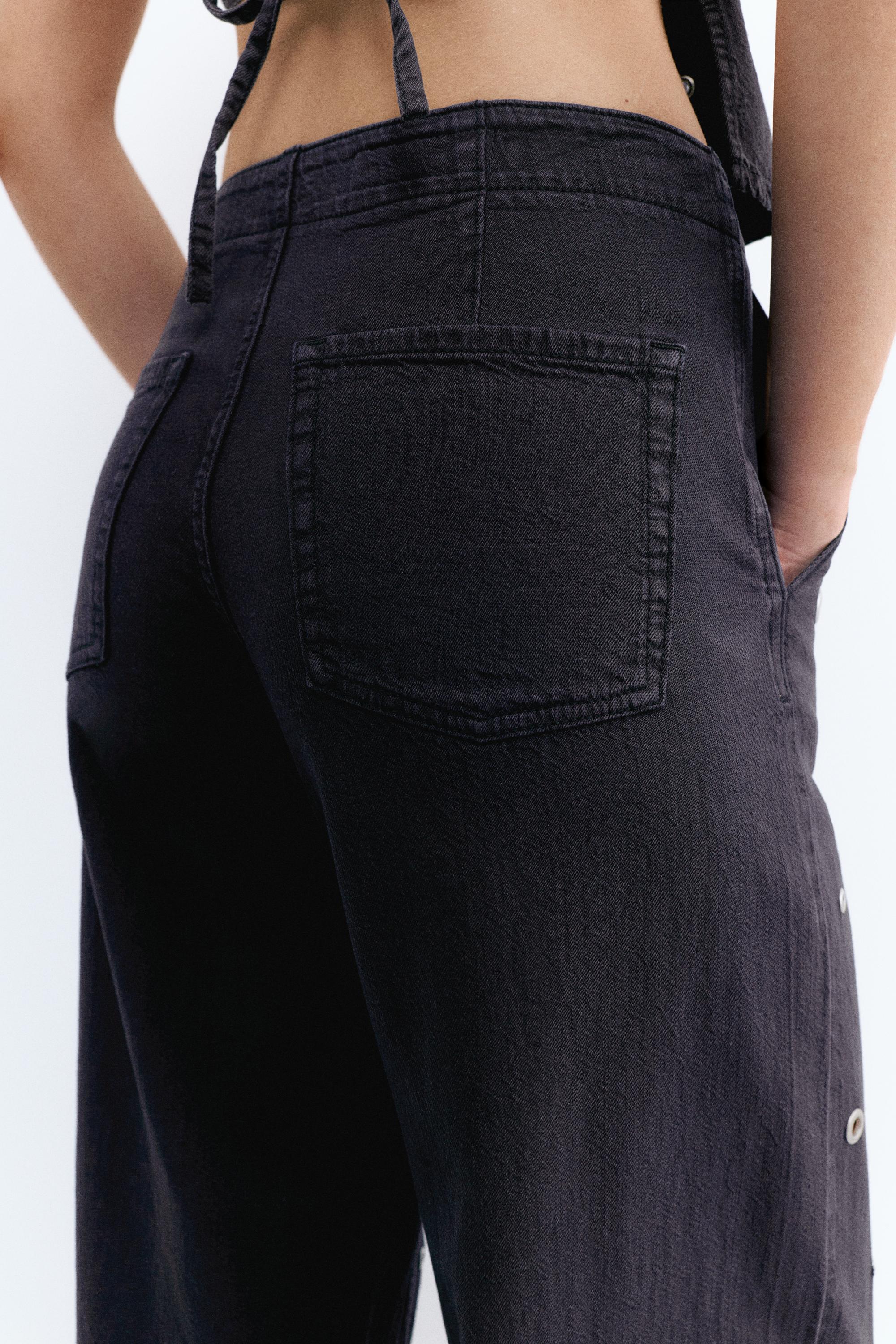 Straight-leg jeans with eyelets — Black