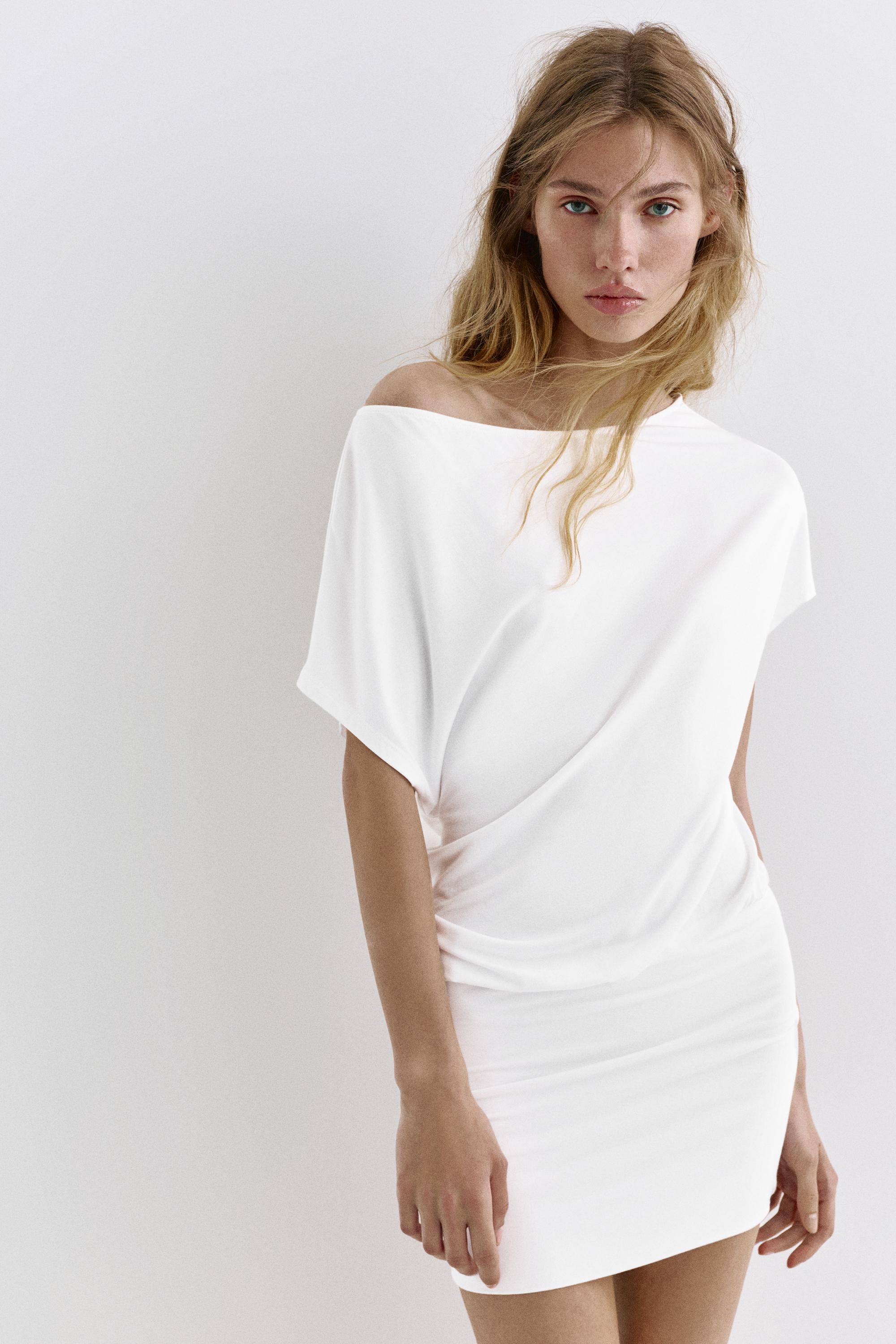 Short asymmetric dress — White