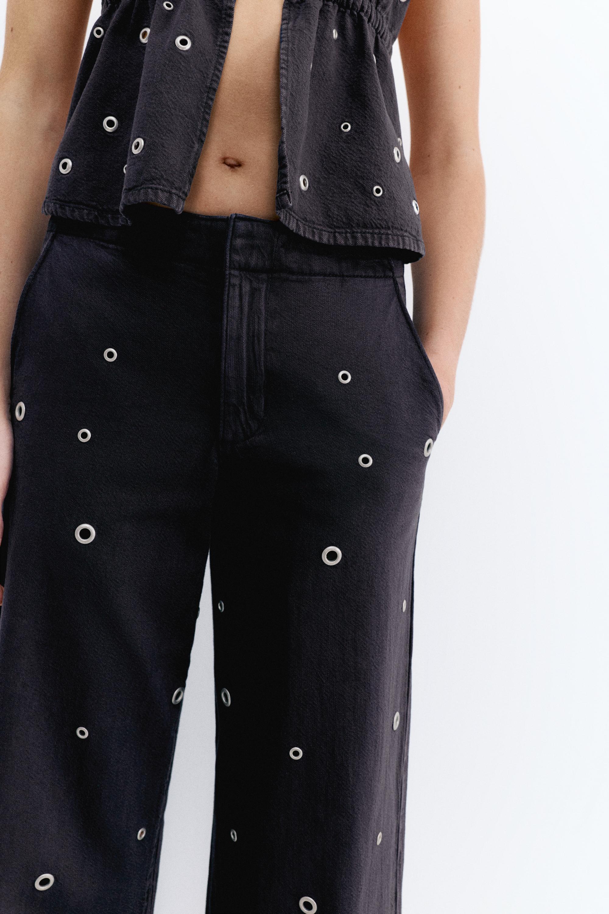 Straight-leg jeans with eyelets — Black