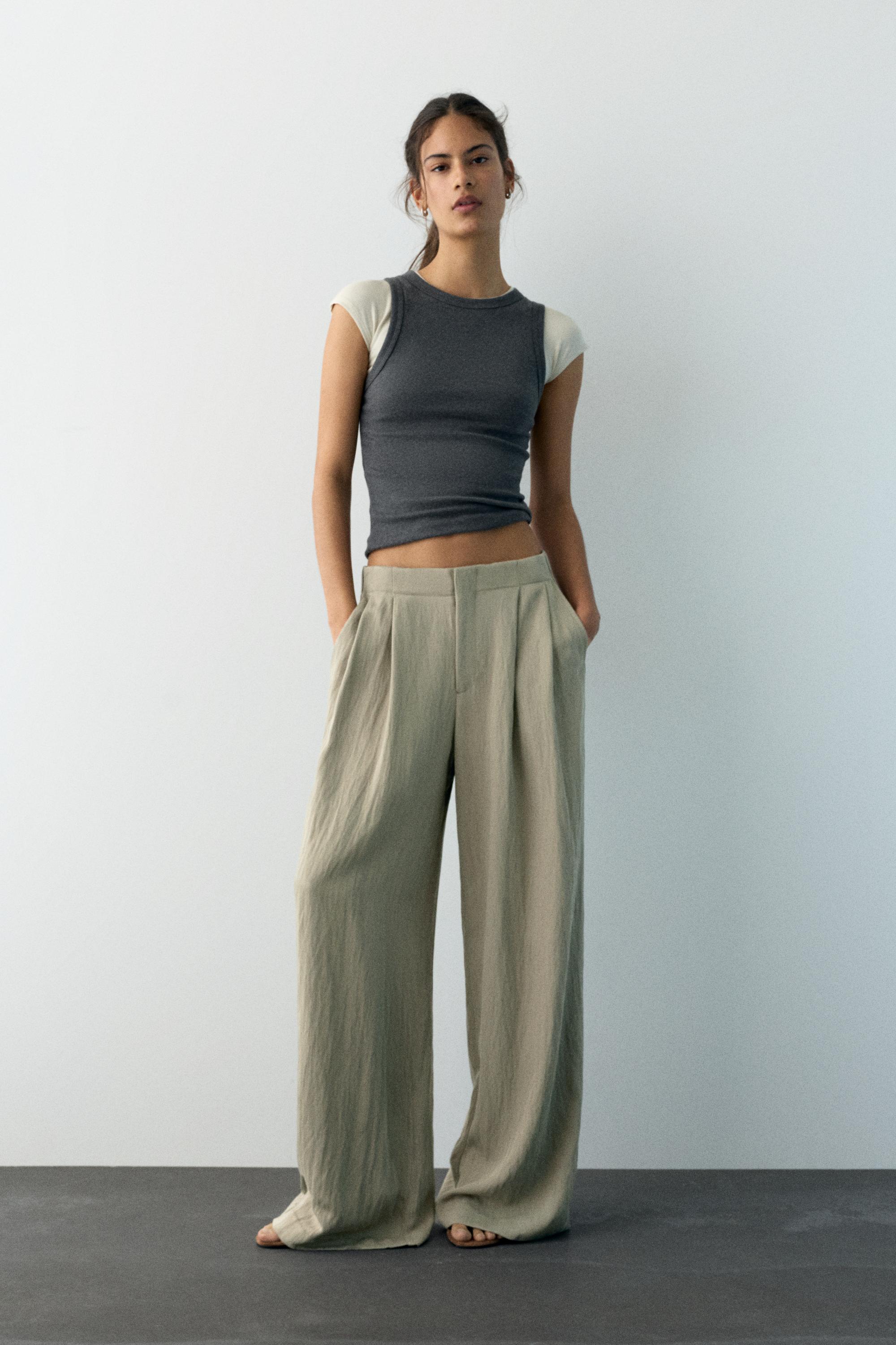 Düğmeli ve fermuarlı, kemer tokalı, önü pensli, elastik belli, tailored fit pantolon. - Görsel 40