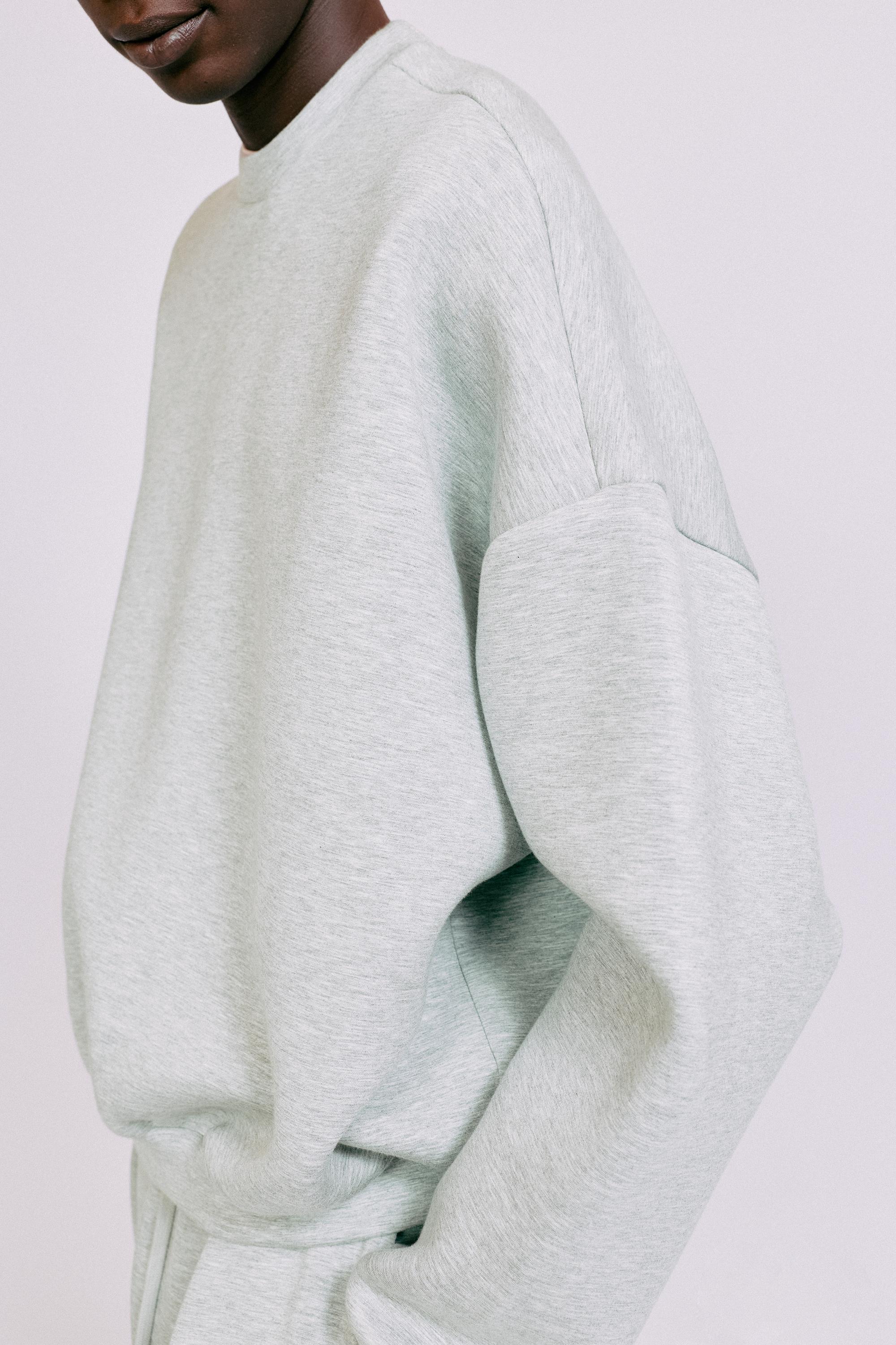 Interlock round neck sweatshirt — Grey marl