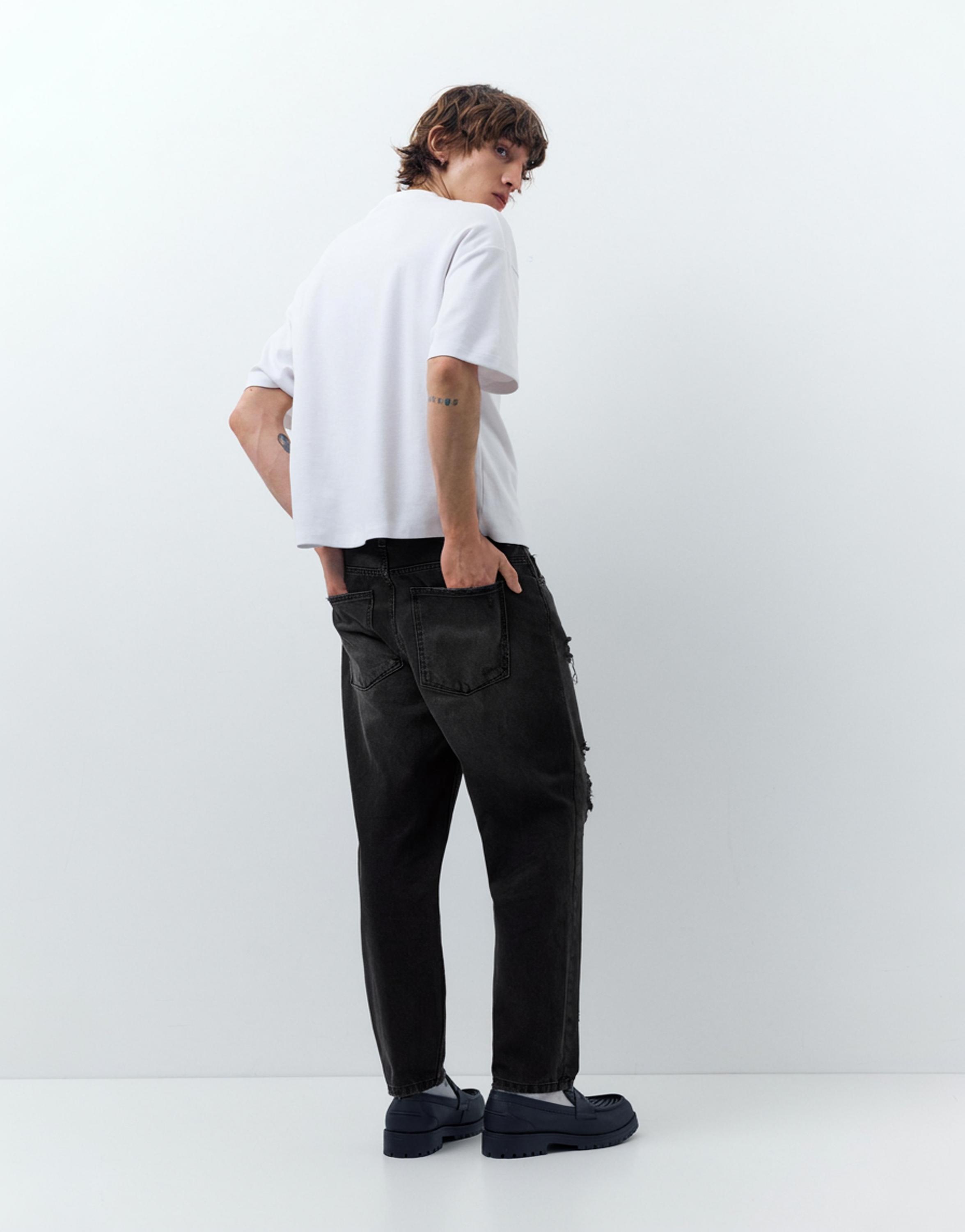 Relaxed fit ripped jeans — Faded black
