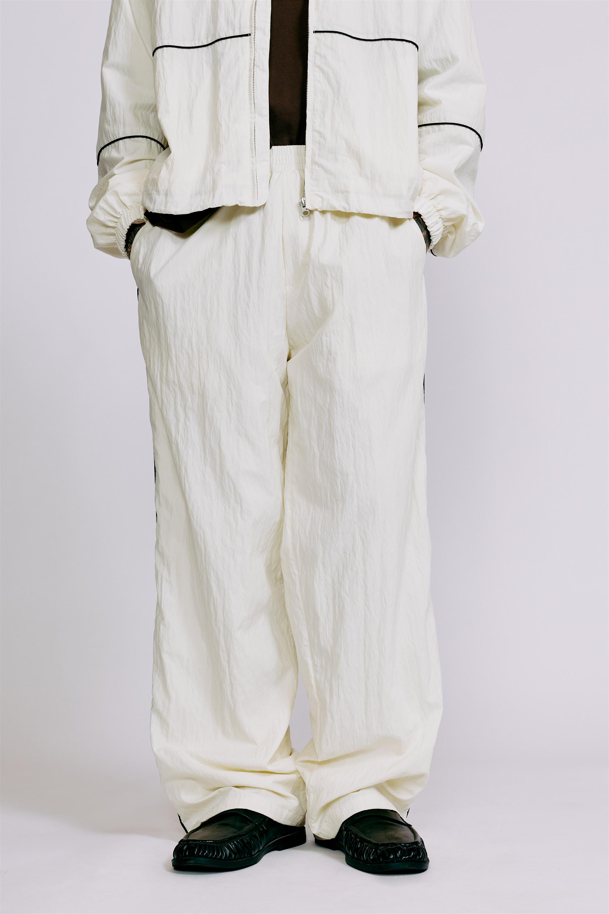 Lightweight contrast stitch joggers — Off white