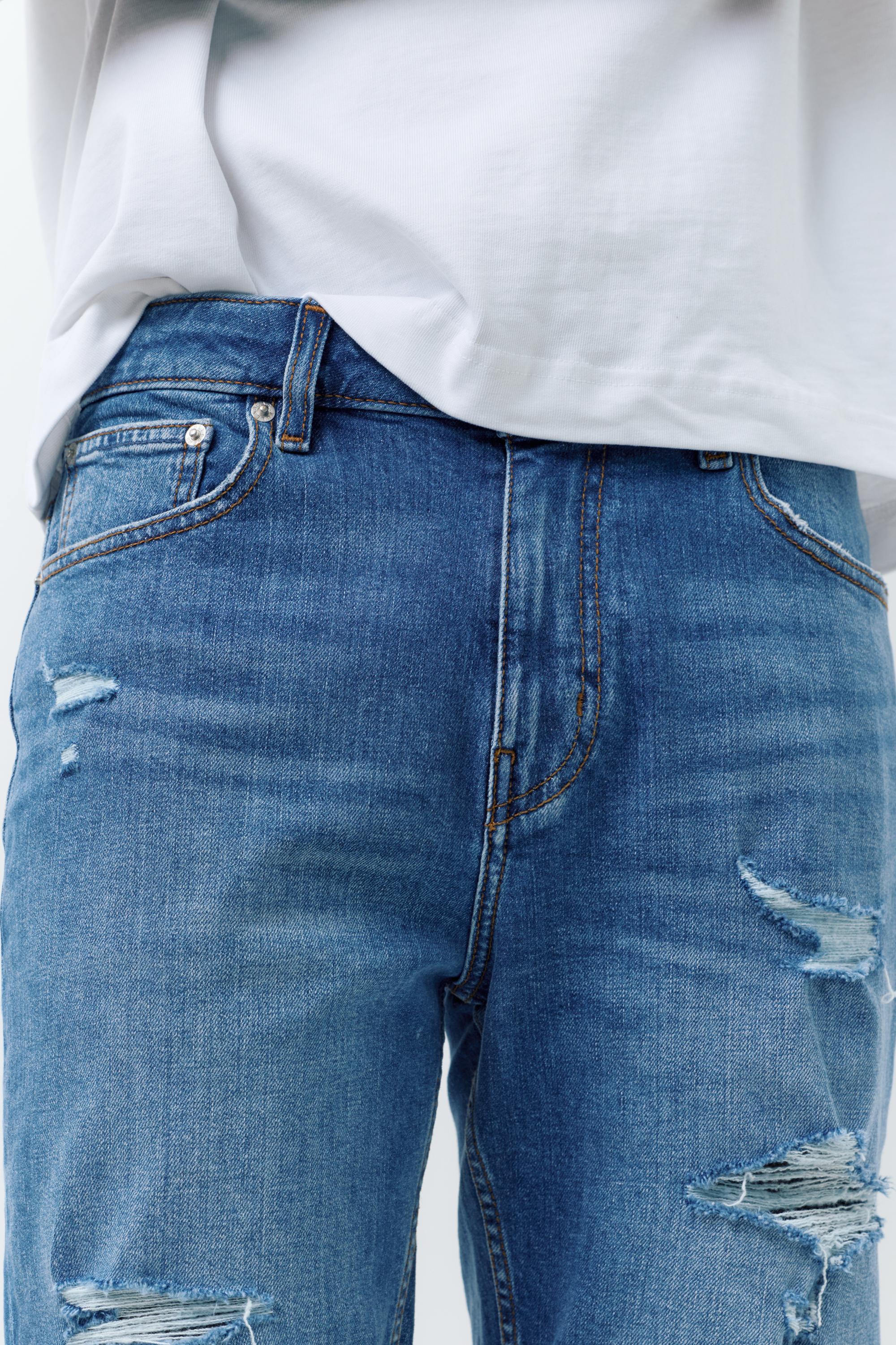 Ripped denim Bermuda shorts — Medium blue