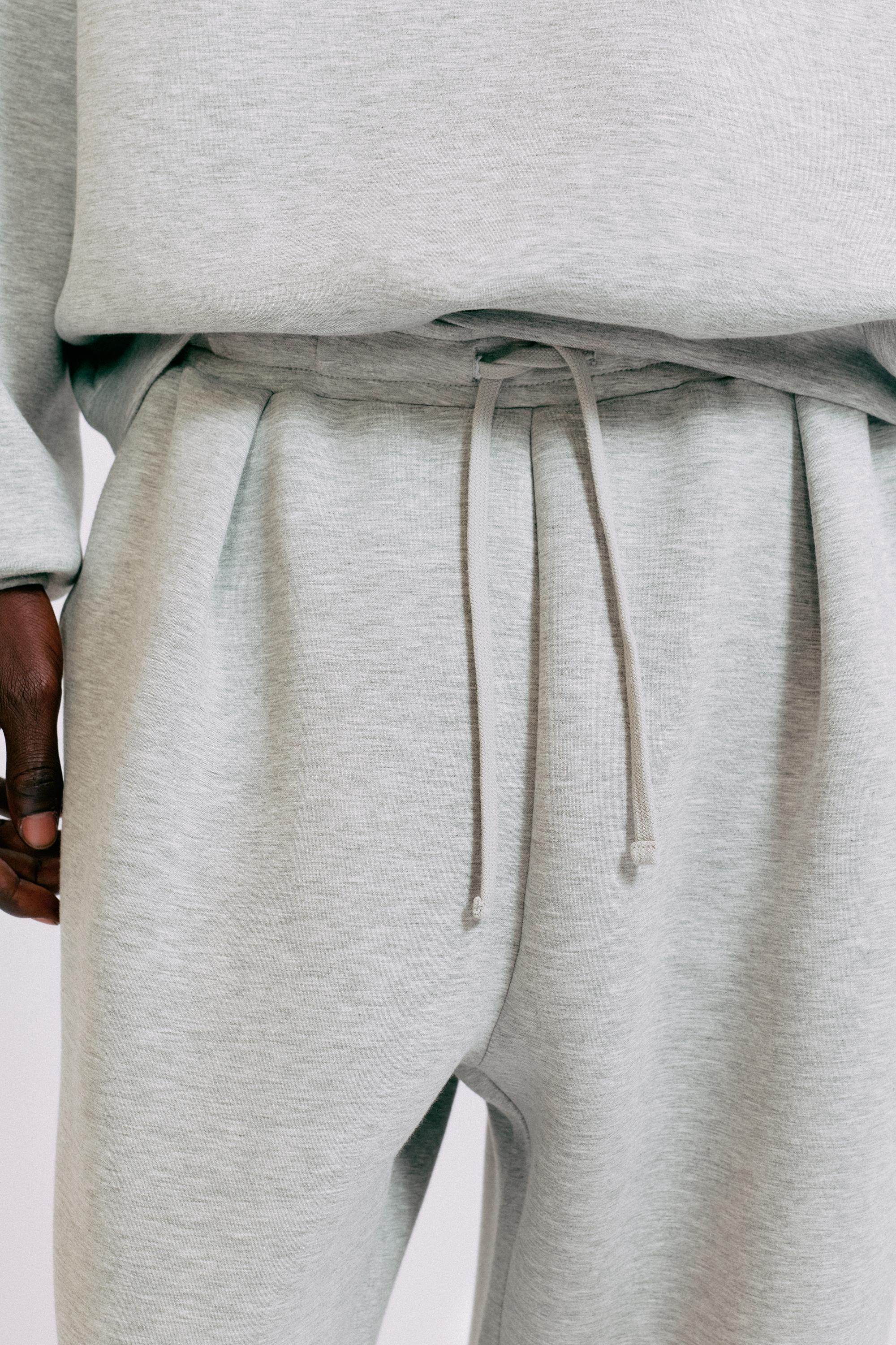 Interlock jogging pants — Grey marl