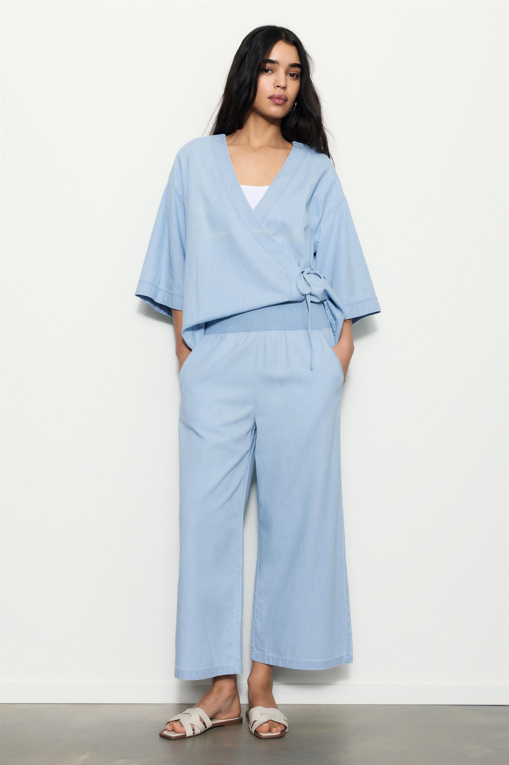 Flowing denim trousers with elasticated waist — Pale blue