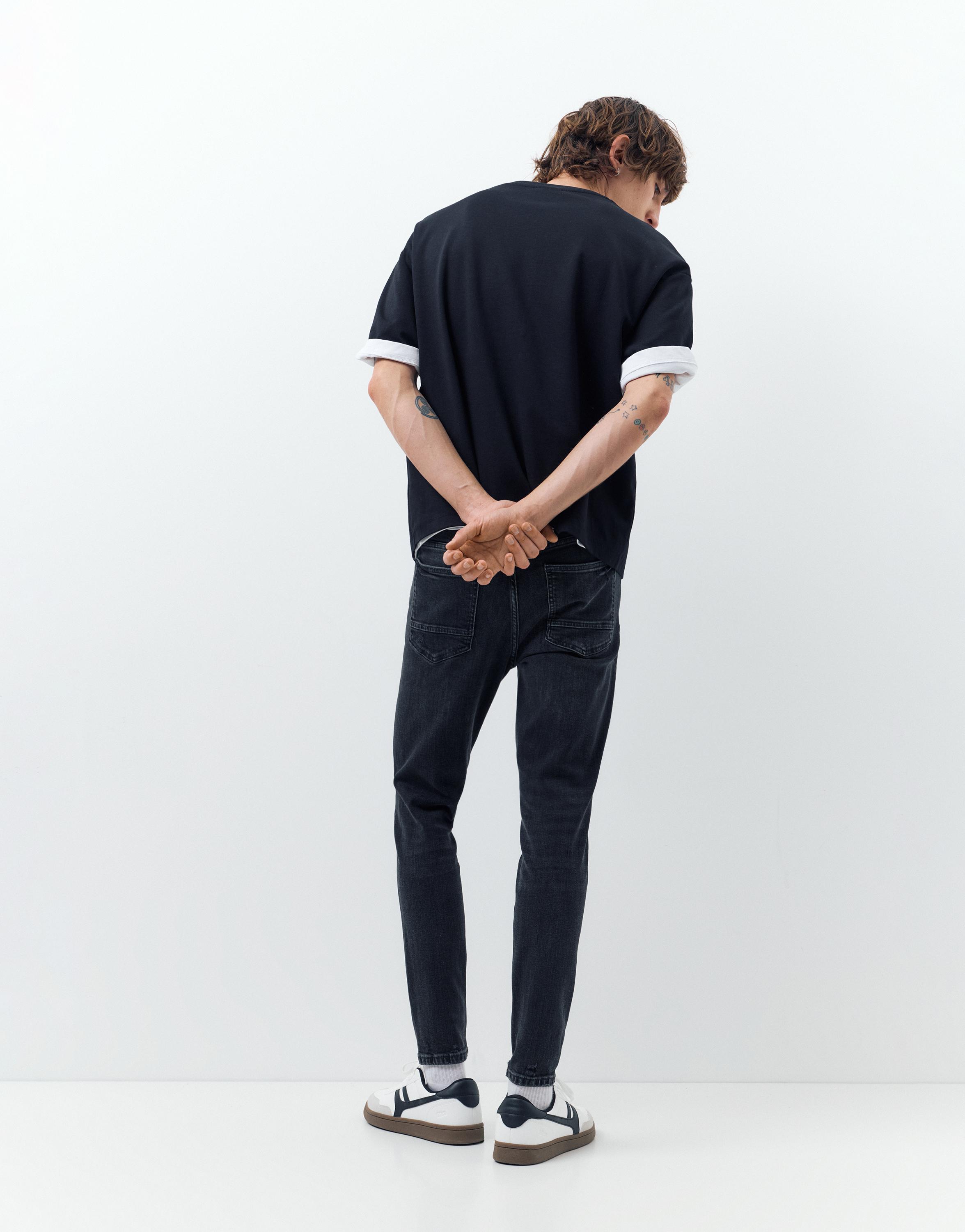 Ripped skinny jeans — Faded black