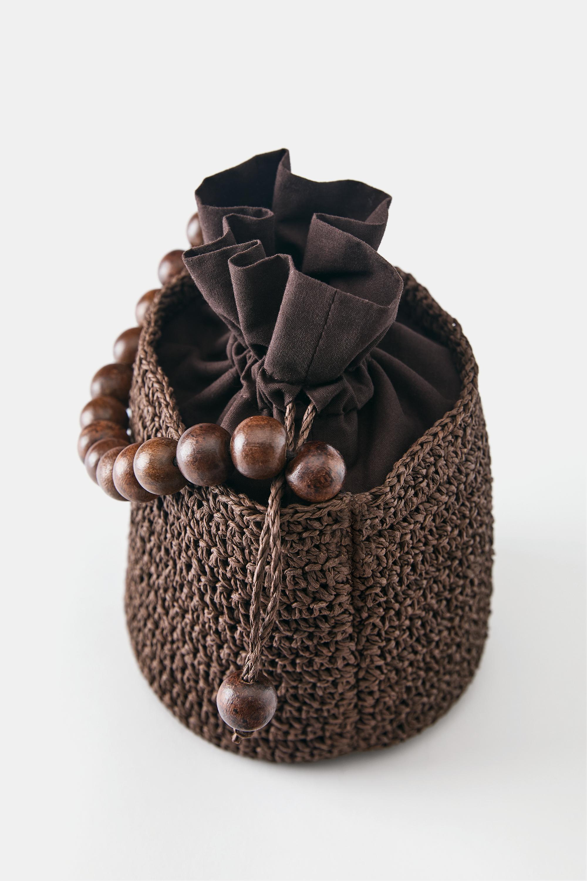 Beaded bucket handbag — Brown
