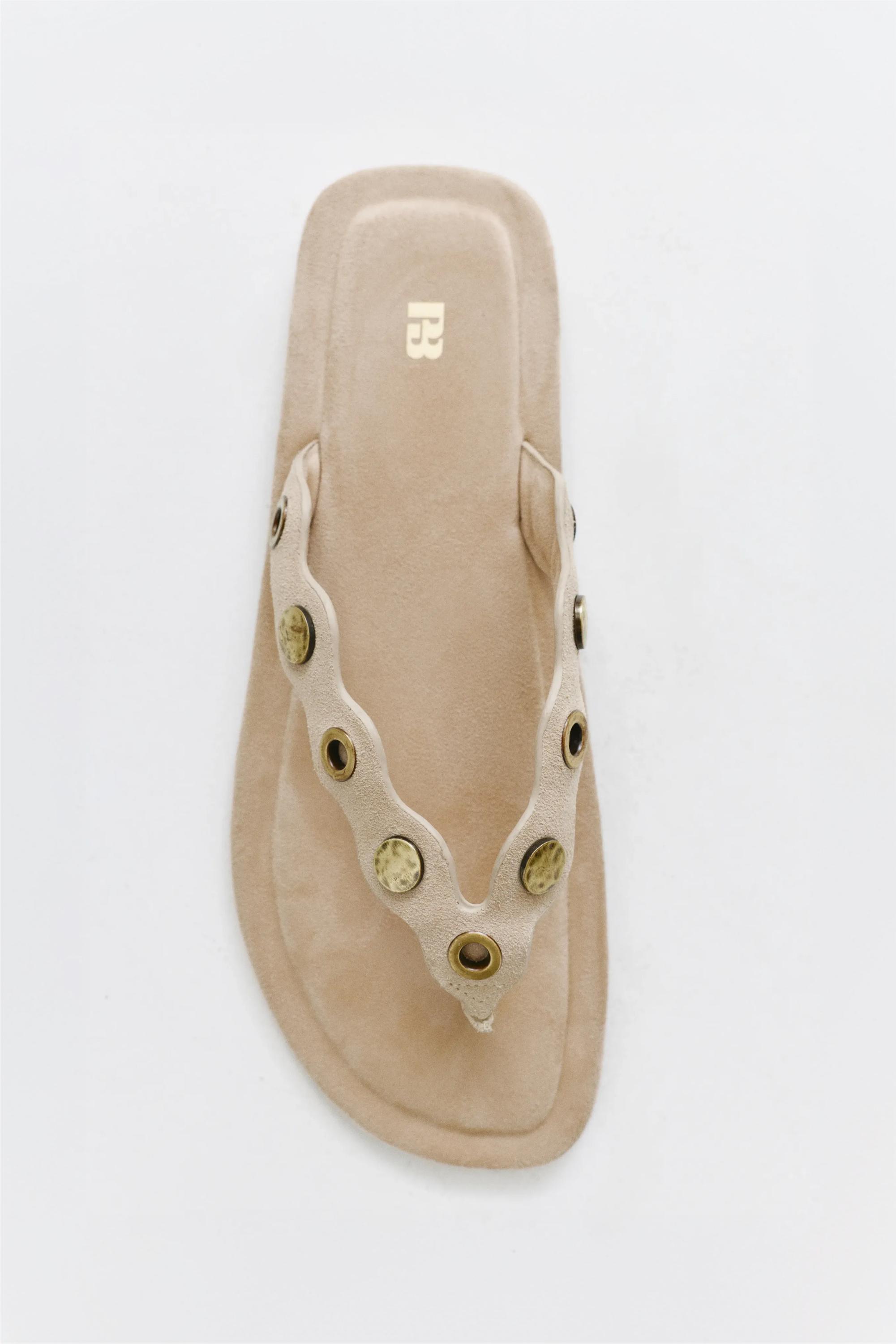 Flat studded leather sandals — Sand
