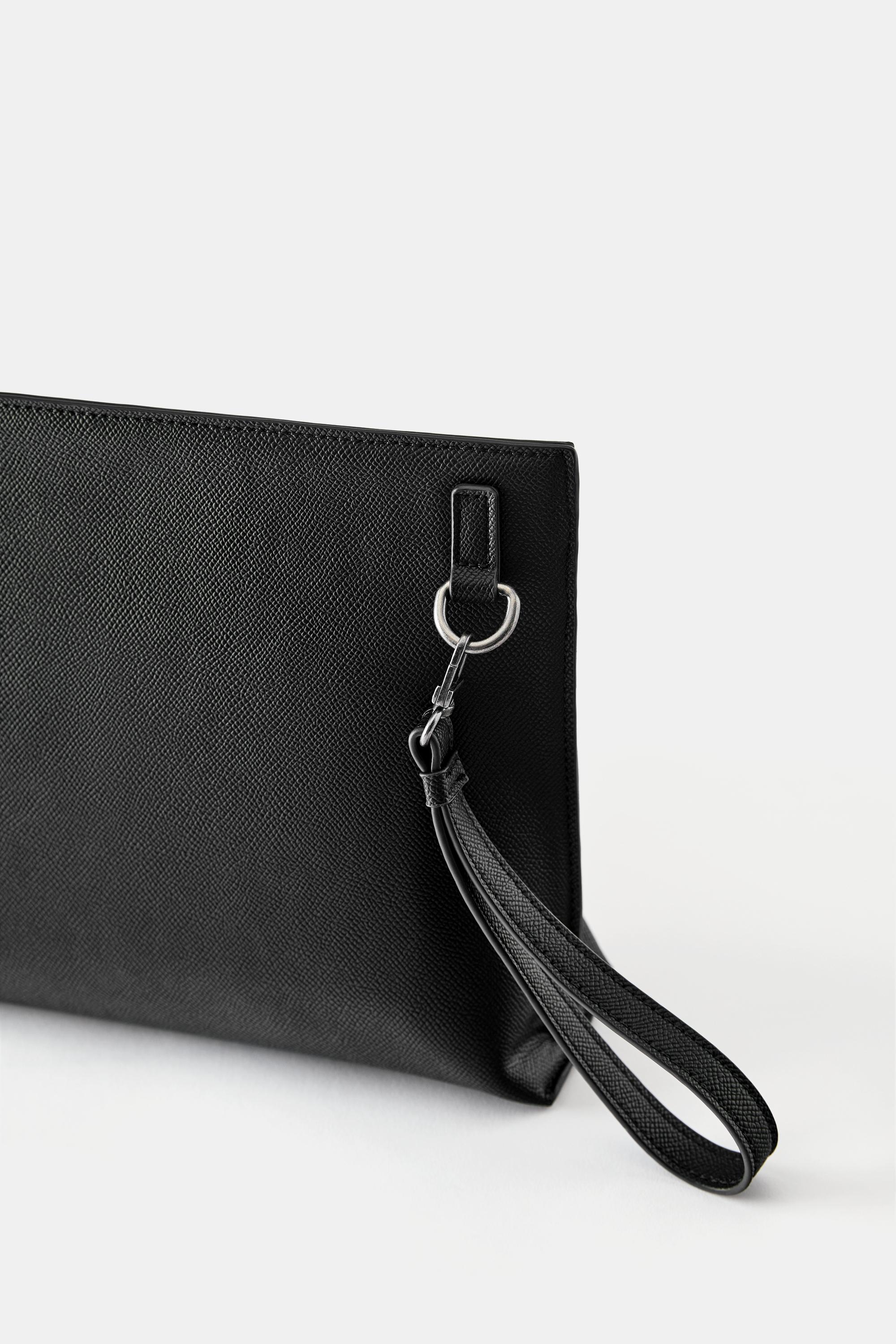 Textured handle clutch bag — Black