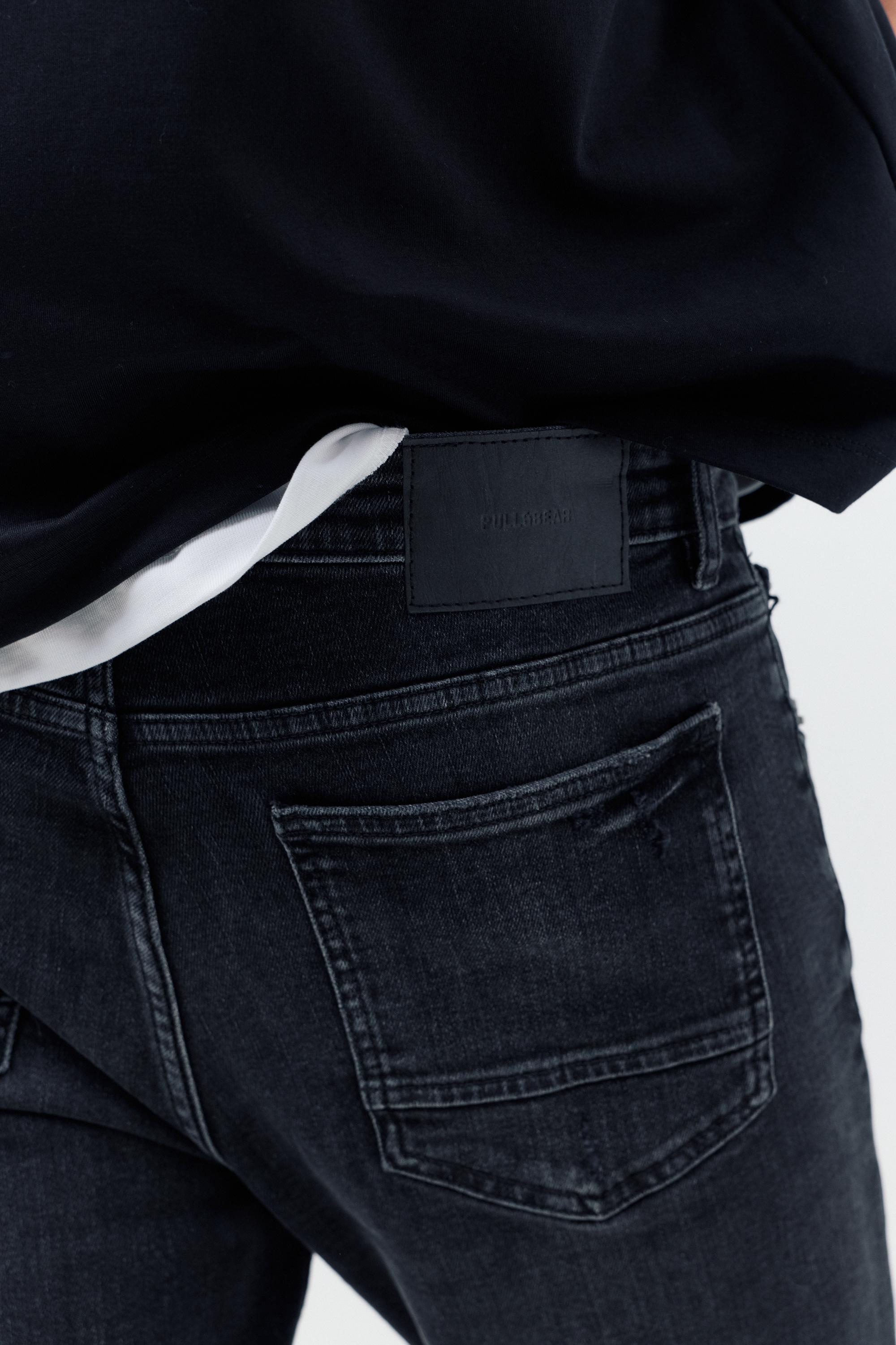 Ripped skinny jeans — Faded black
