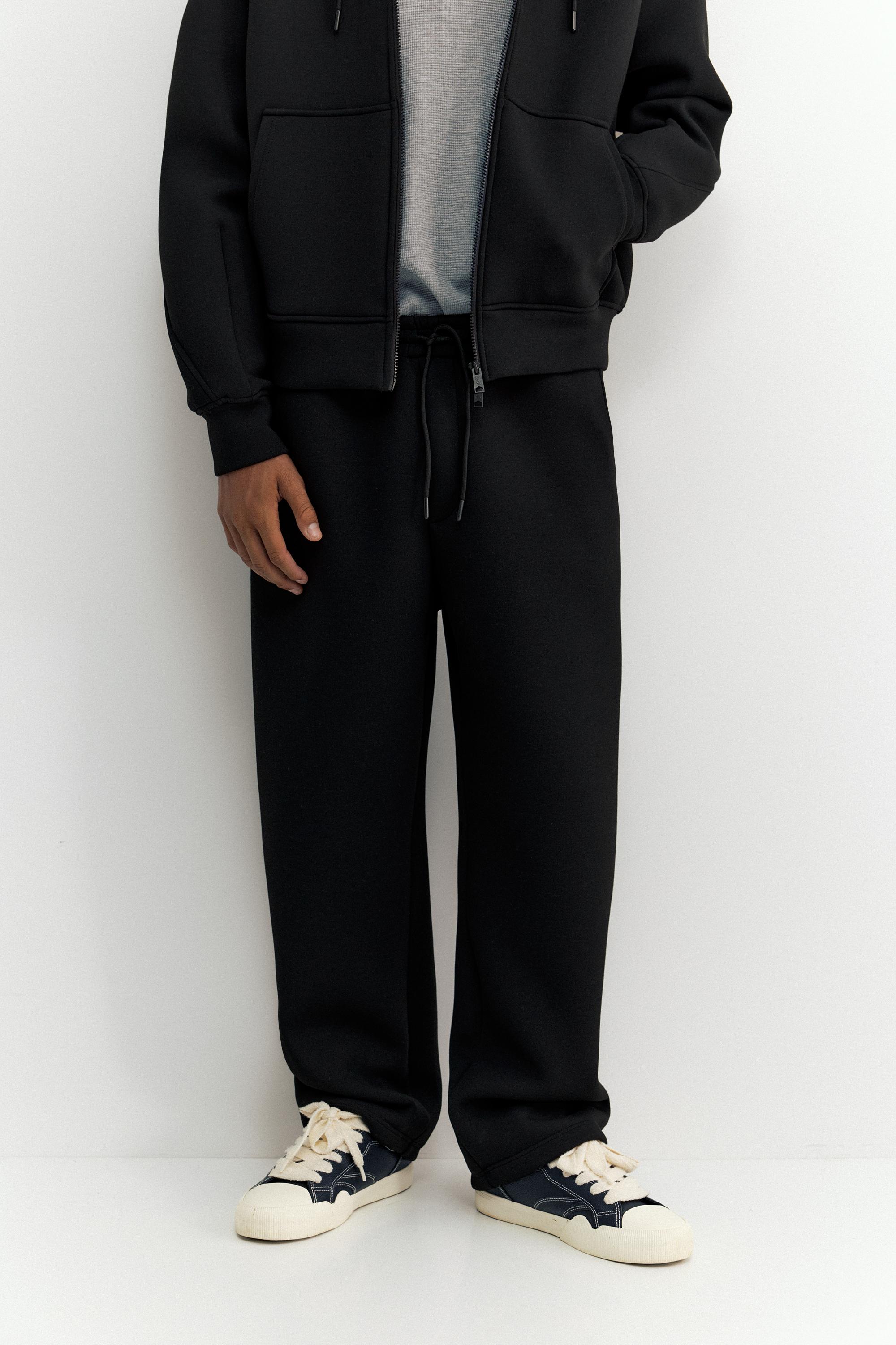 Neoprene-effect baggy trousers — Black