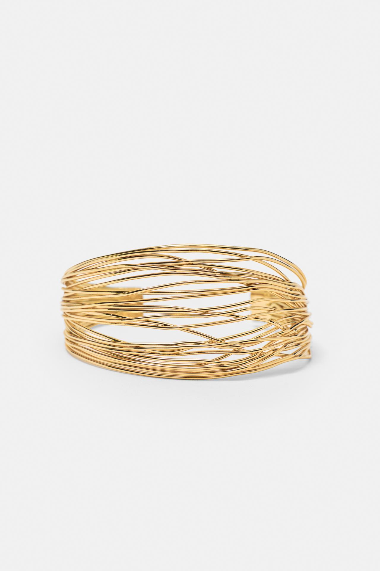 Fine-strand arm cuff — Gold
