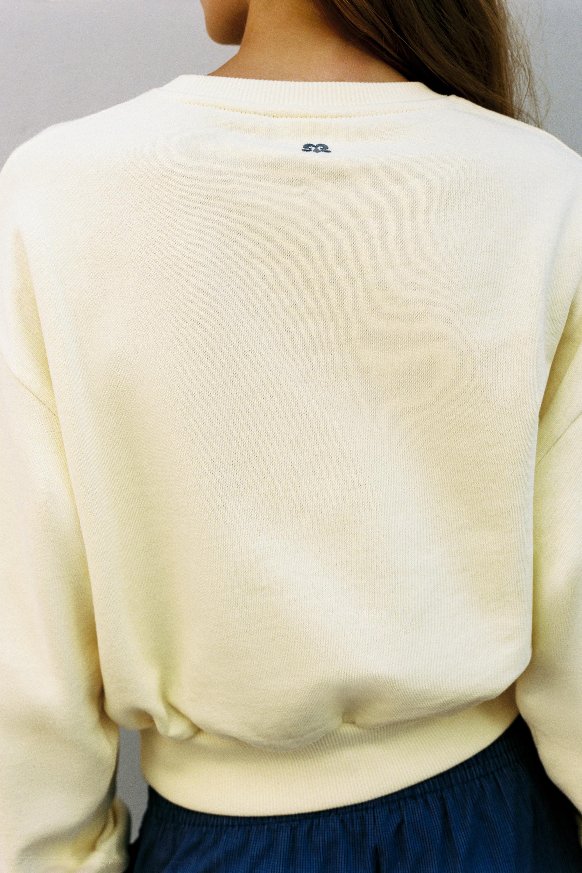 Round neck sweatshirt — Pale yellow