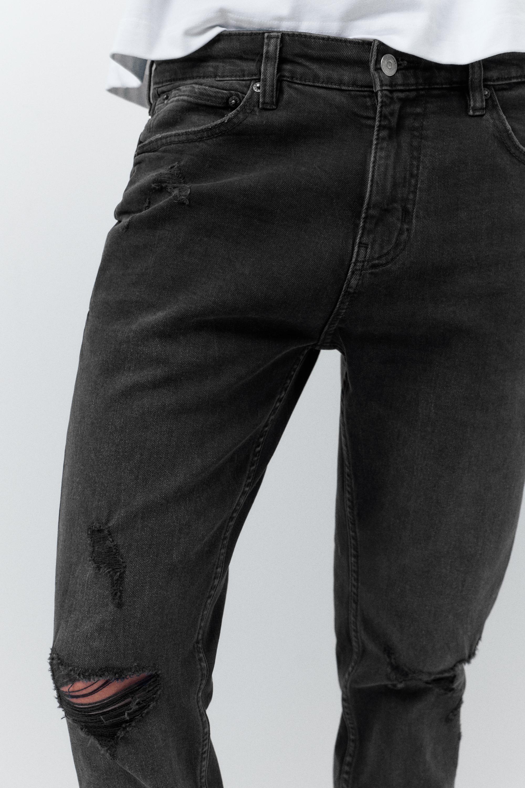 Ripped skinny jeans — Faded black