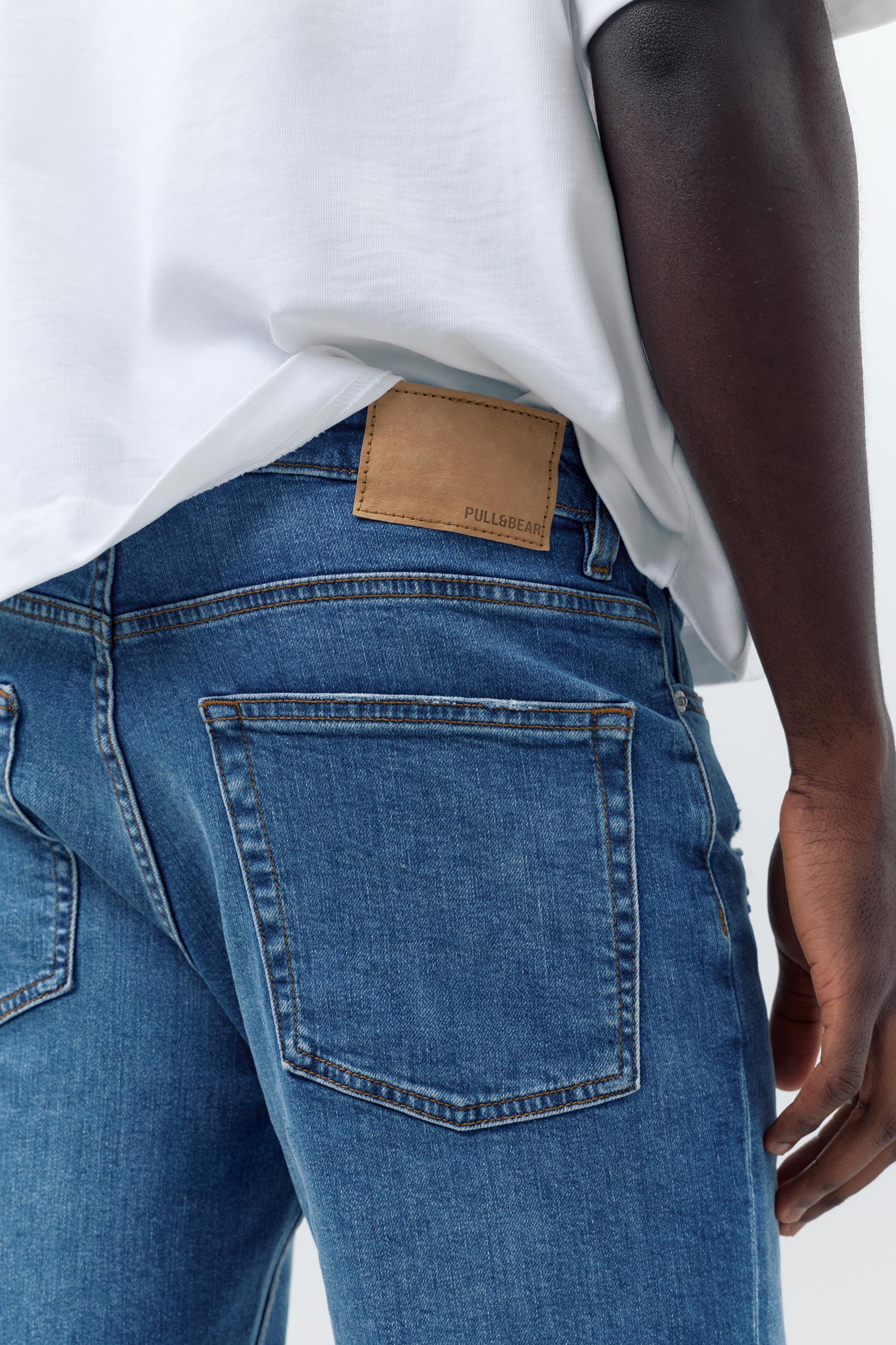 Ripped denim Bermuda shorts — Medium blue