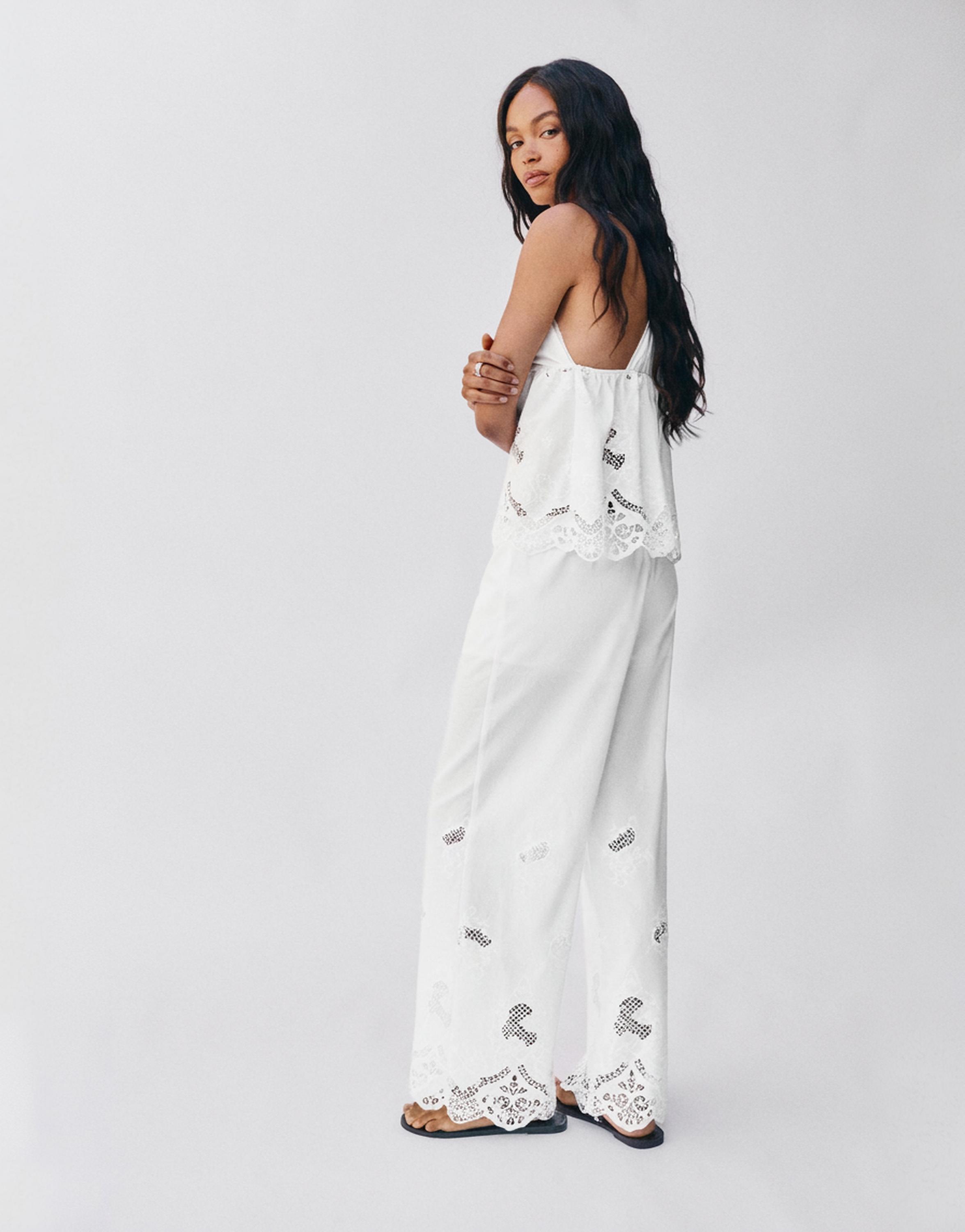 White trousers with Swiss embroidery — White