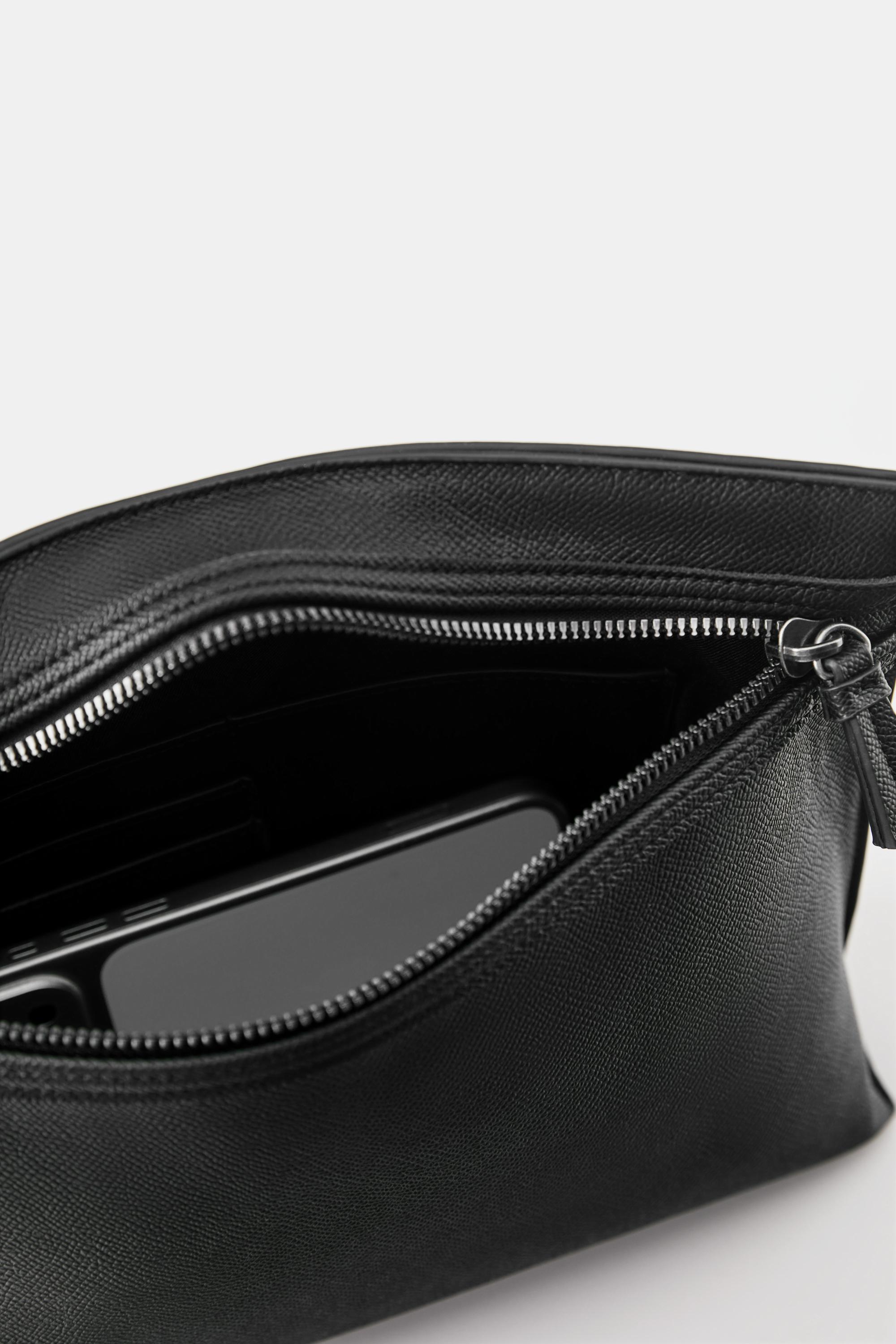 Textured handle clutch bag — Black