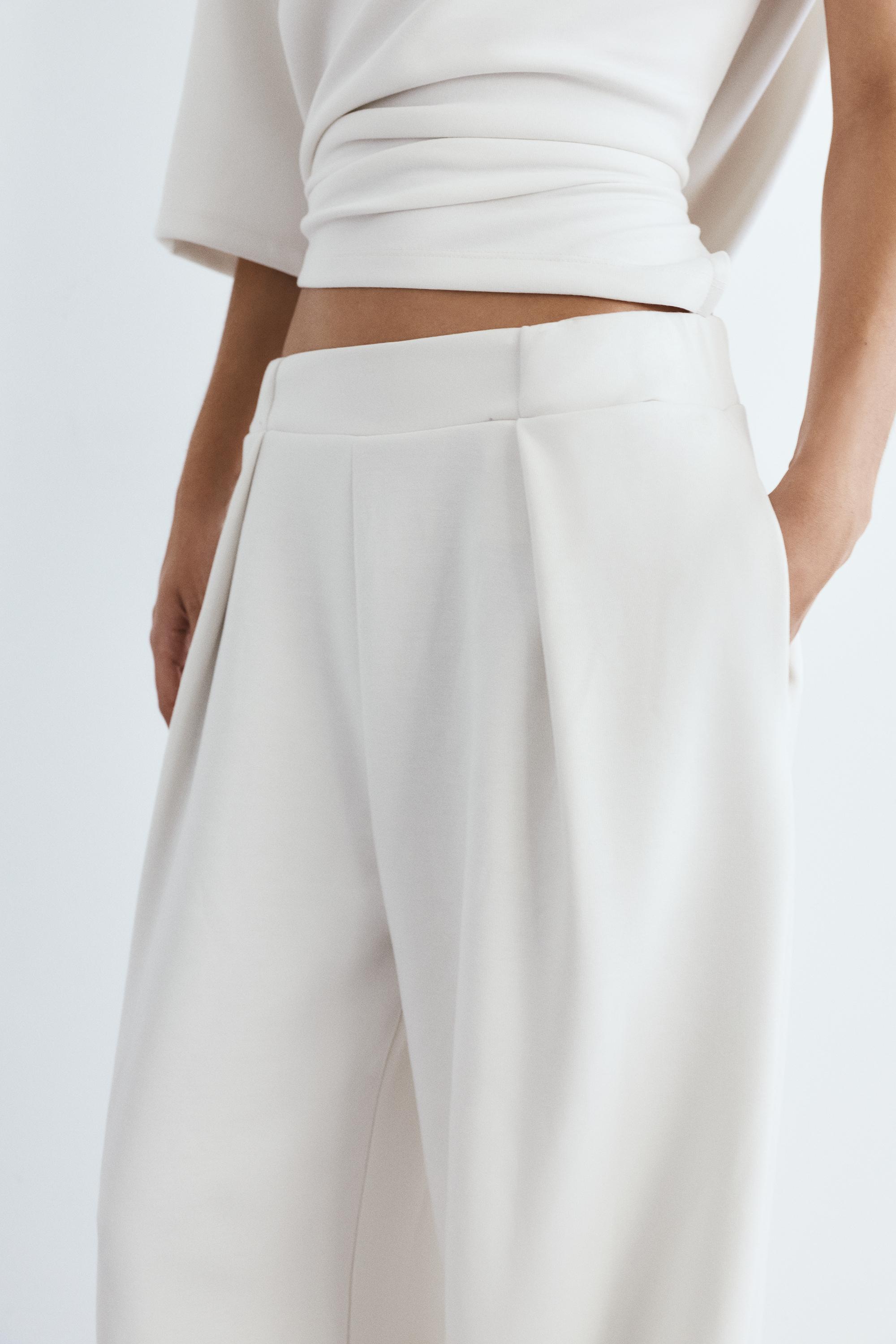 Soft-touch wide-leg darted trousers — Ecru