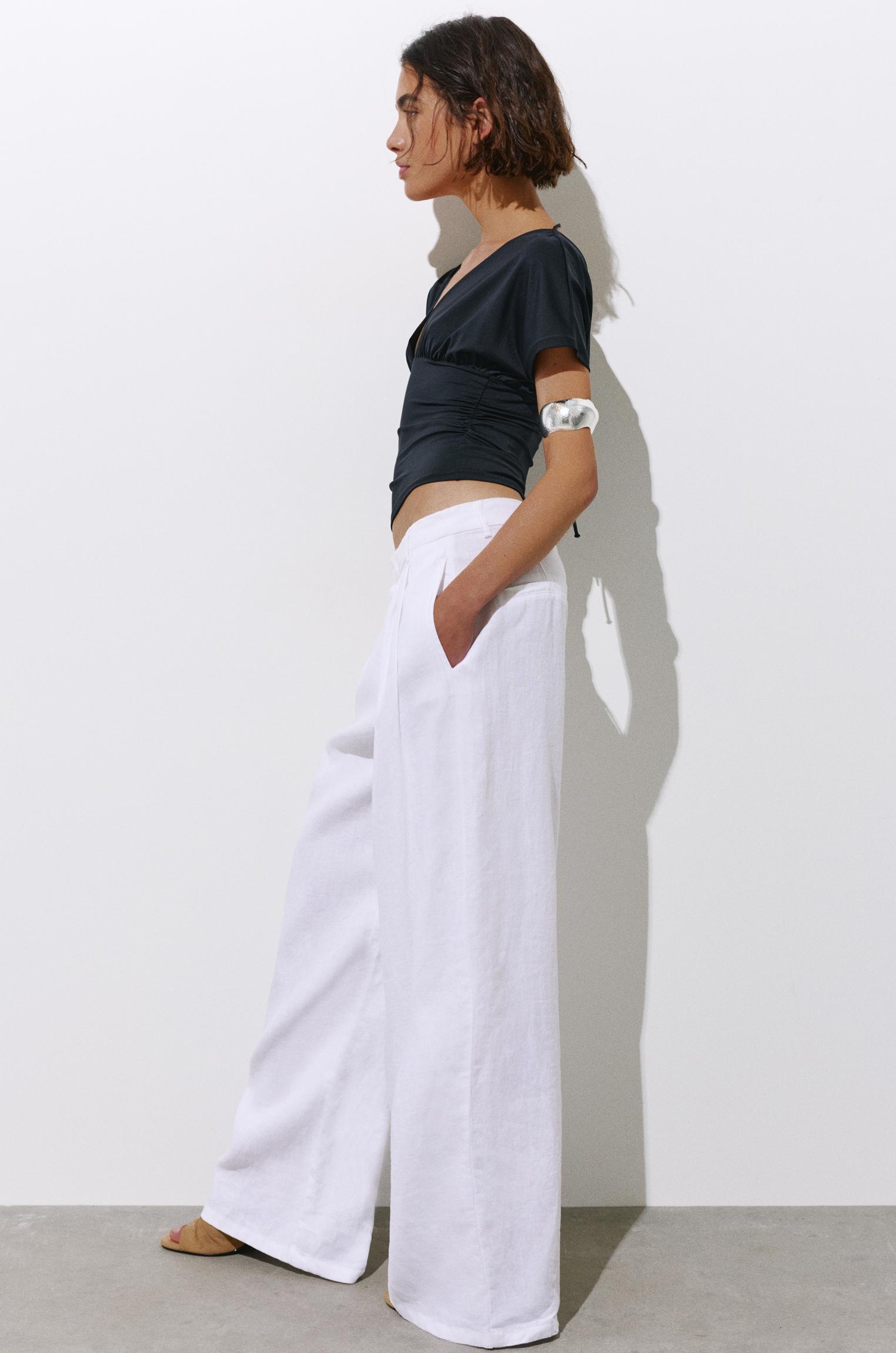 Gathered V-neck top — Black