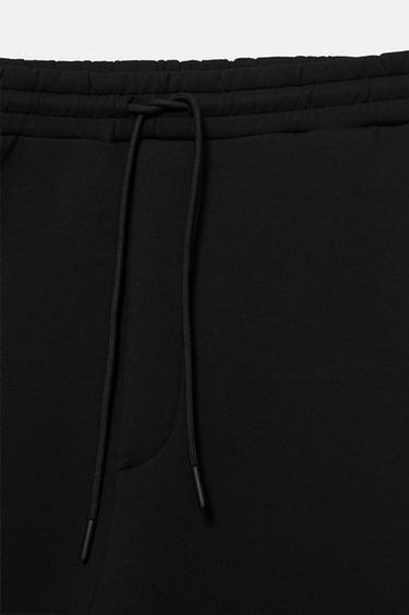 Neoprene-effect baggy trousers — Black 11