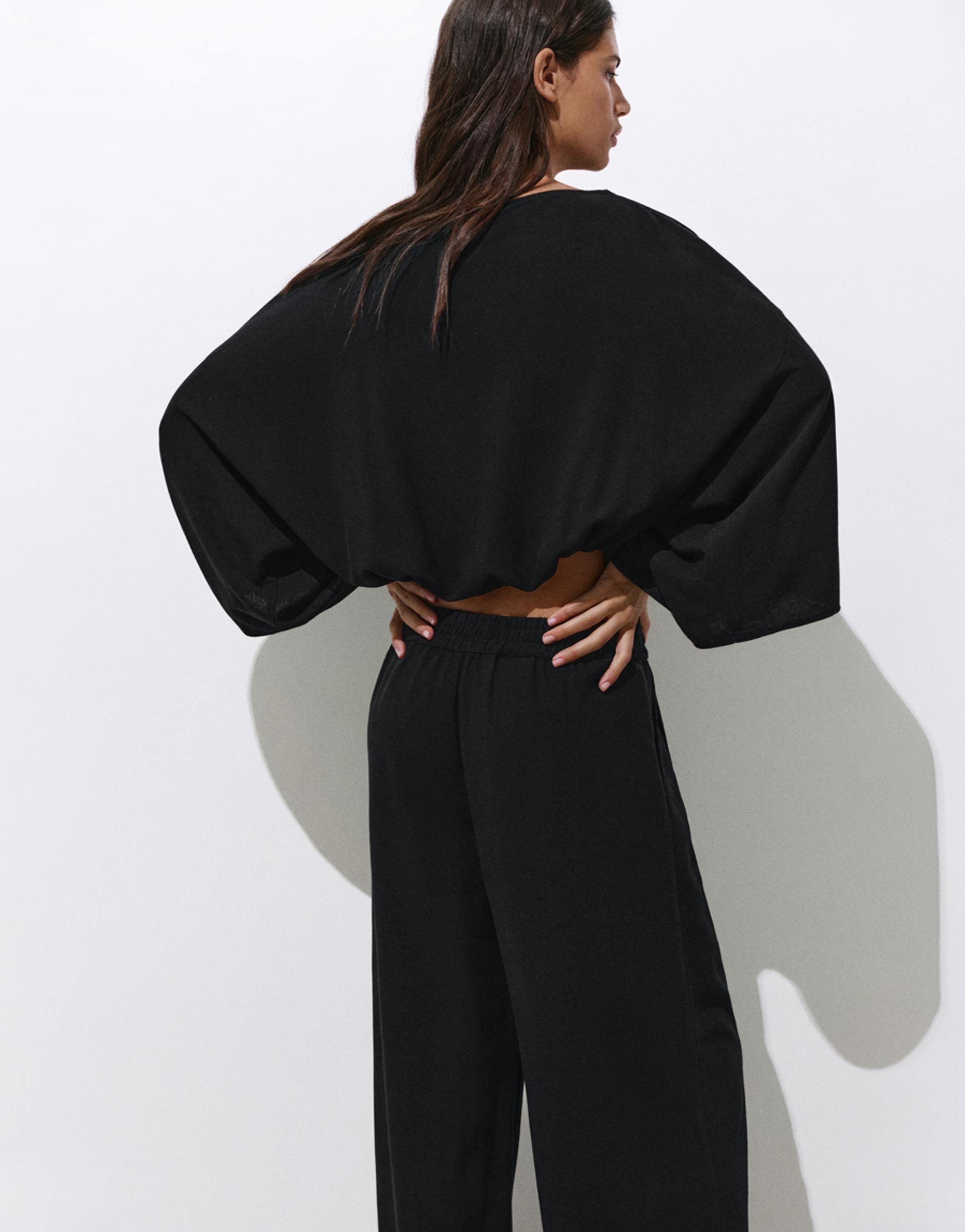 Cape blouse — Black