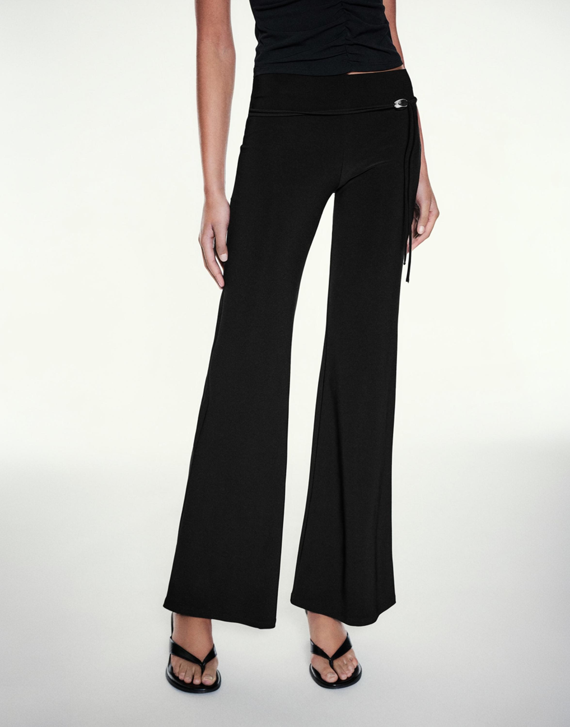 Black flared trousers — Black