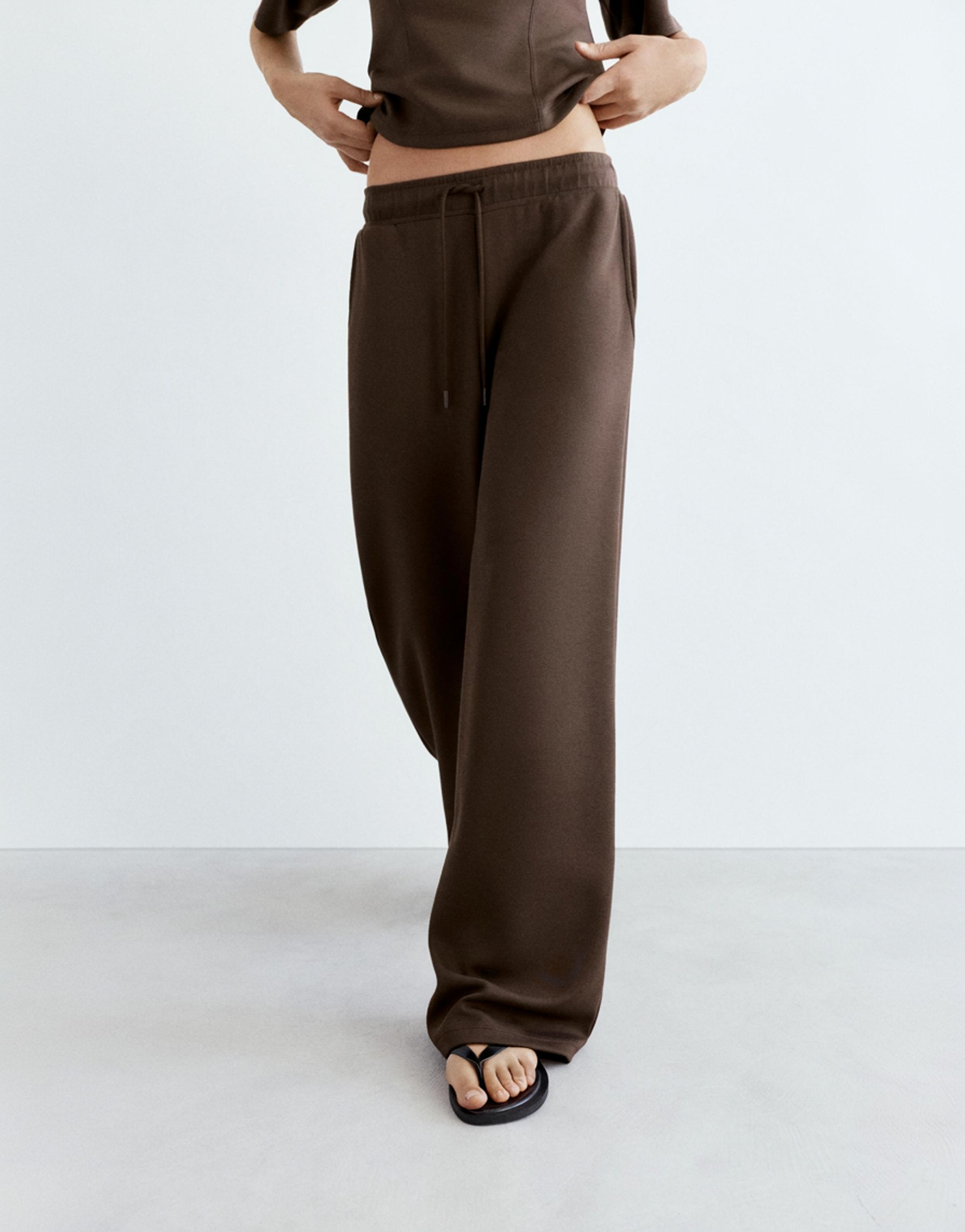 Soft-touch wide-leg trousers — Brown
