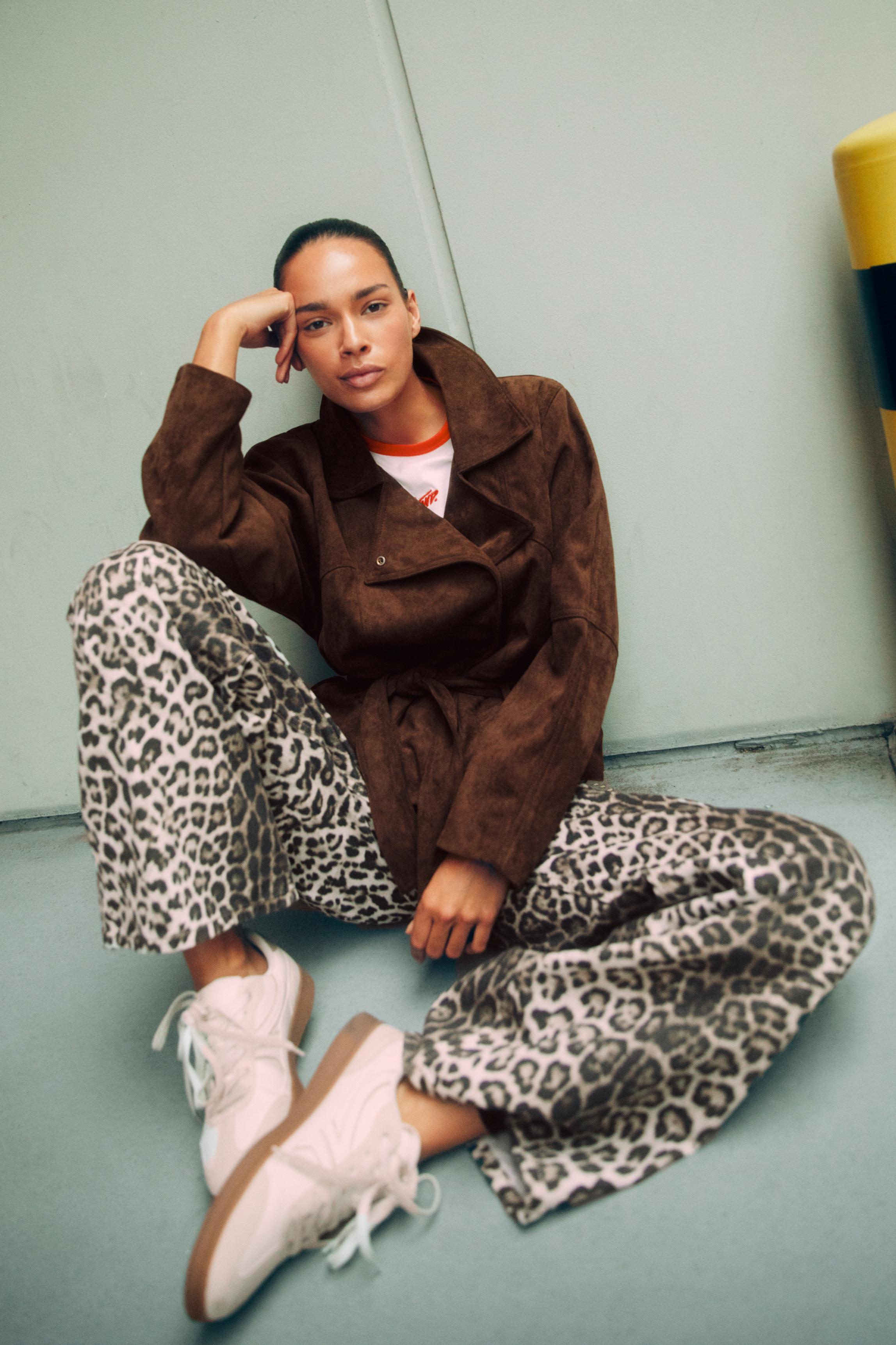 Leopard print baggy jeans — Brown