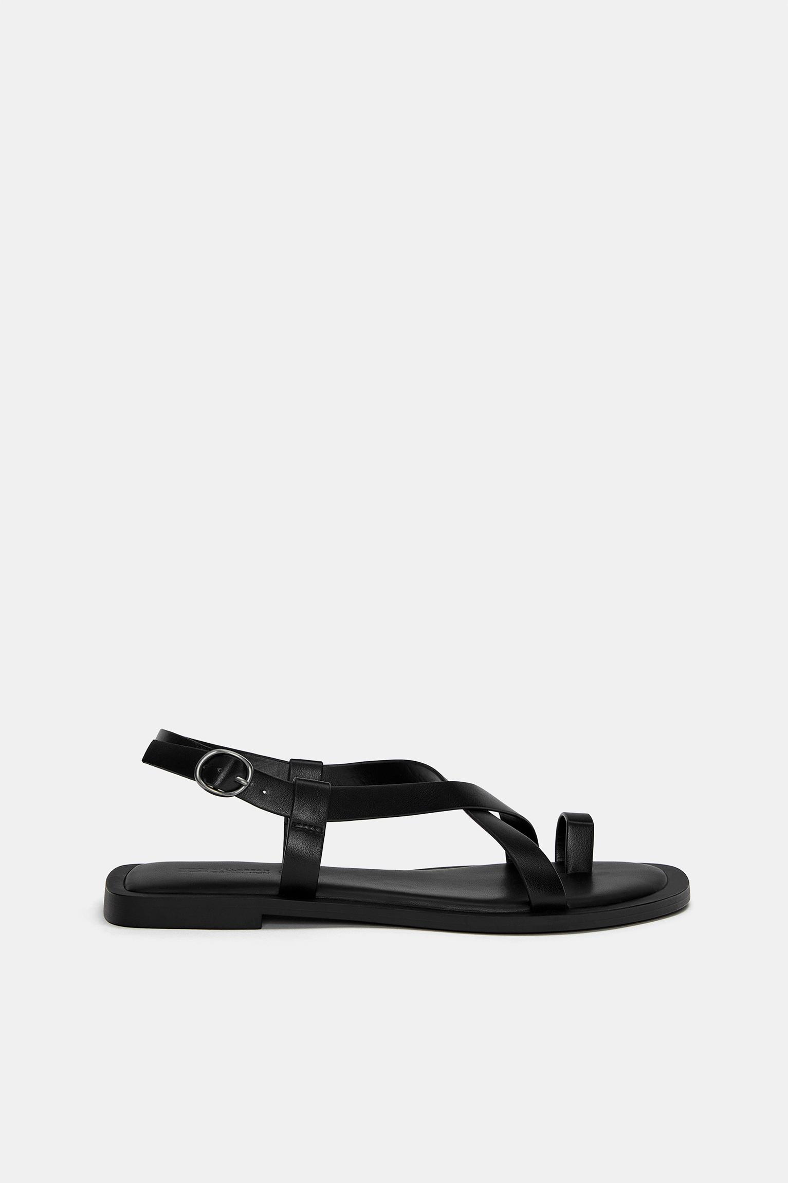 Flache Zehensandalen