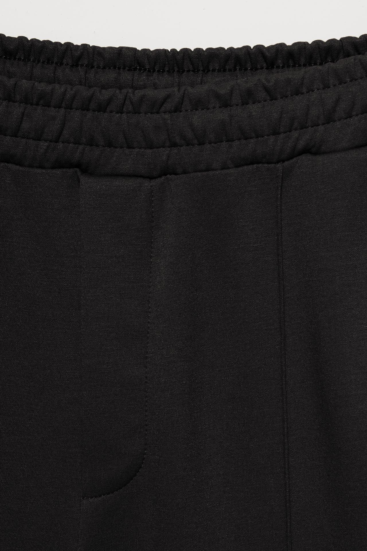 Seamed jogging trousers — Black