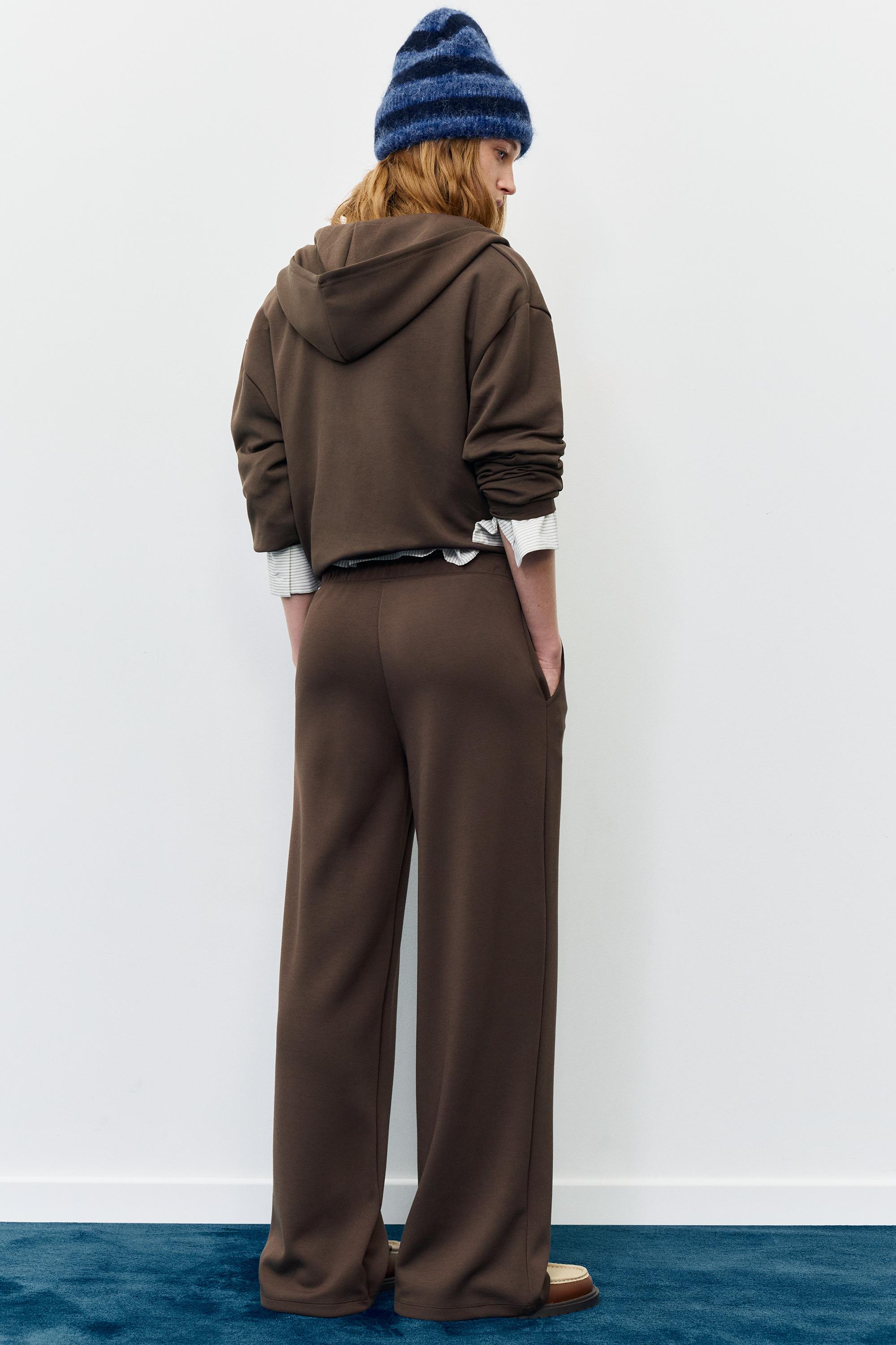 Soft-touch wide-leg trousers — Brown