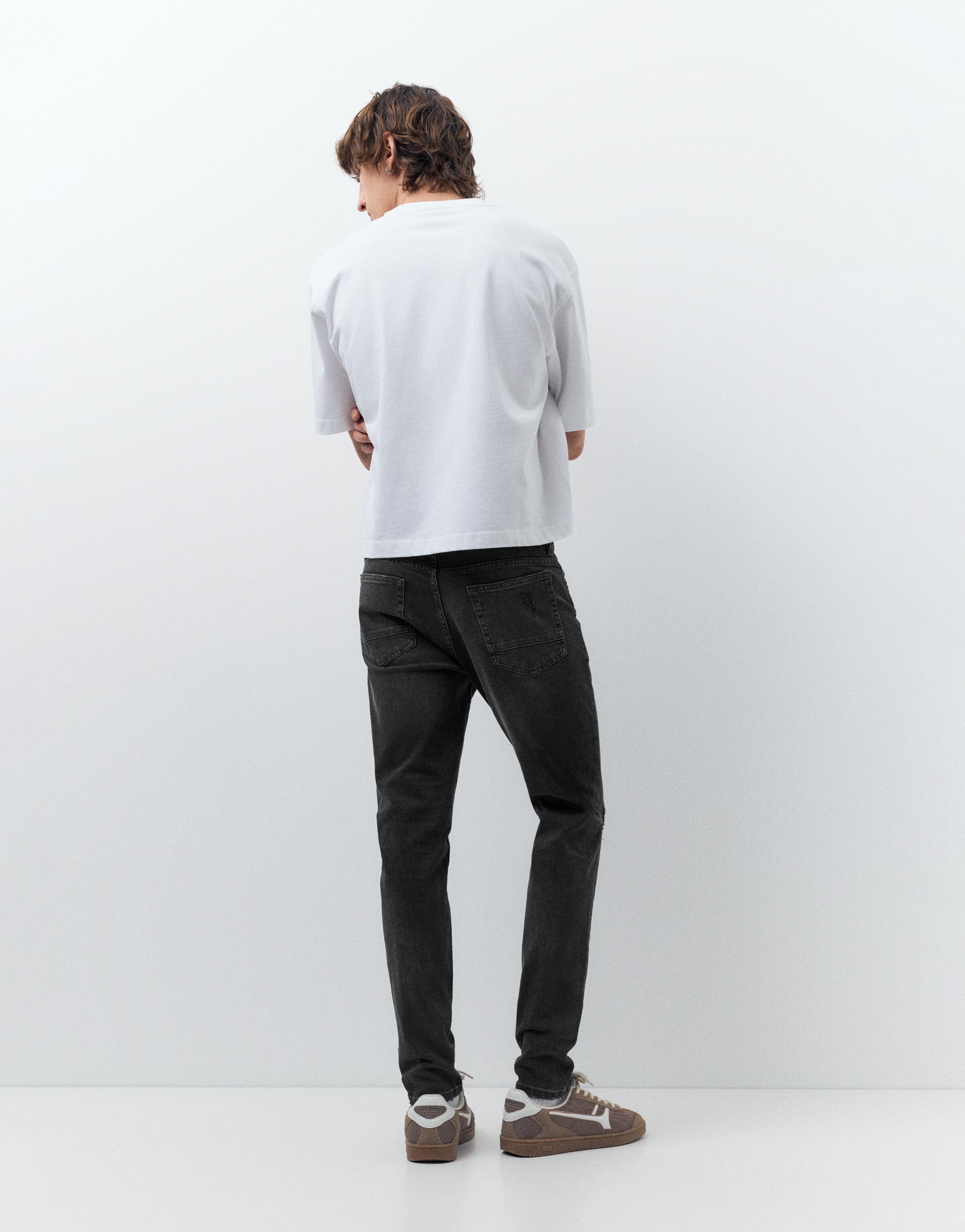 Ripped skinny jeans — Faded black