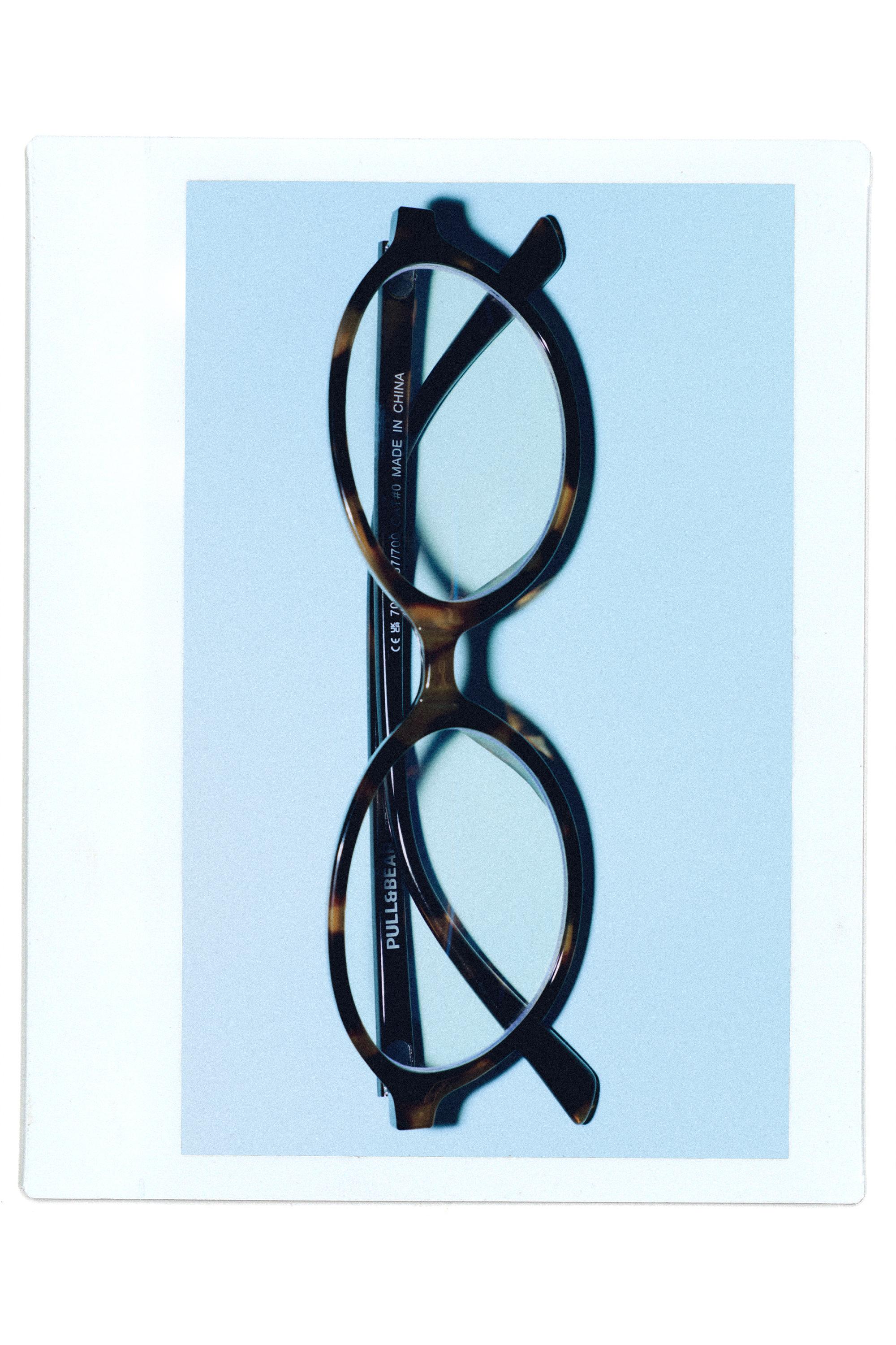 Oval tortoiseshell-effect sunglasses — Brown
