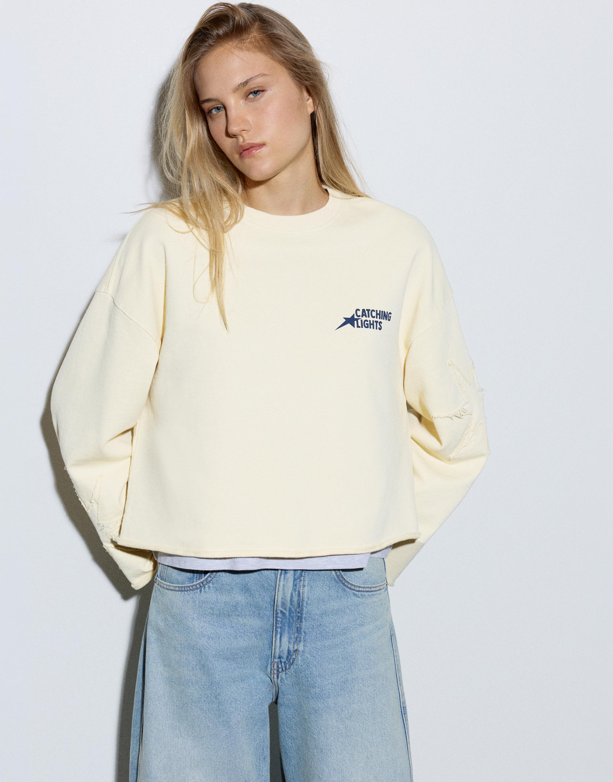 Cropped star graphic sweatshirt — Yellow