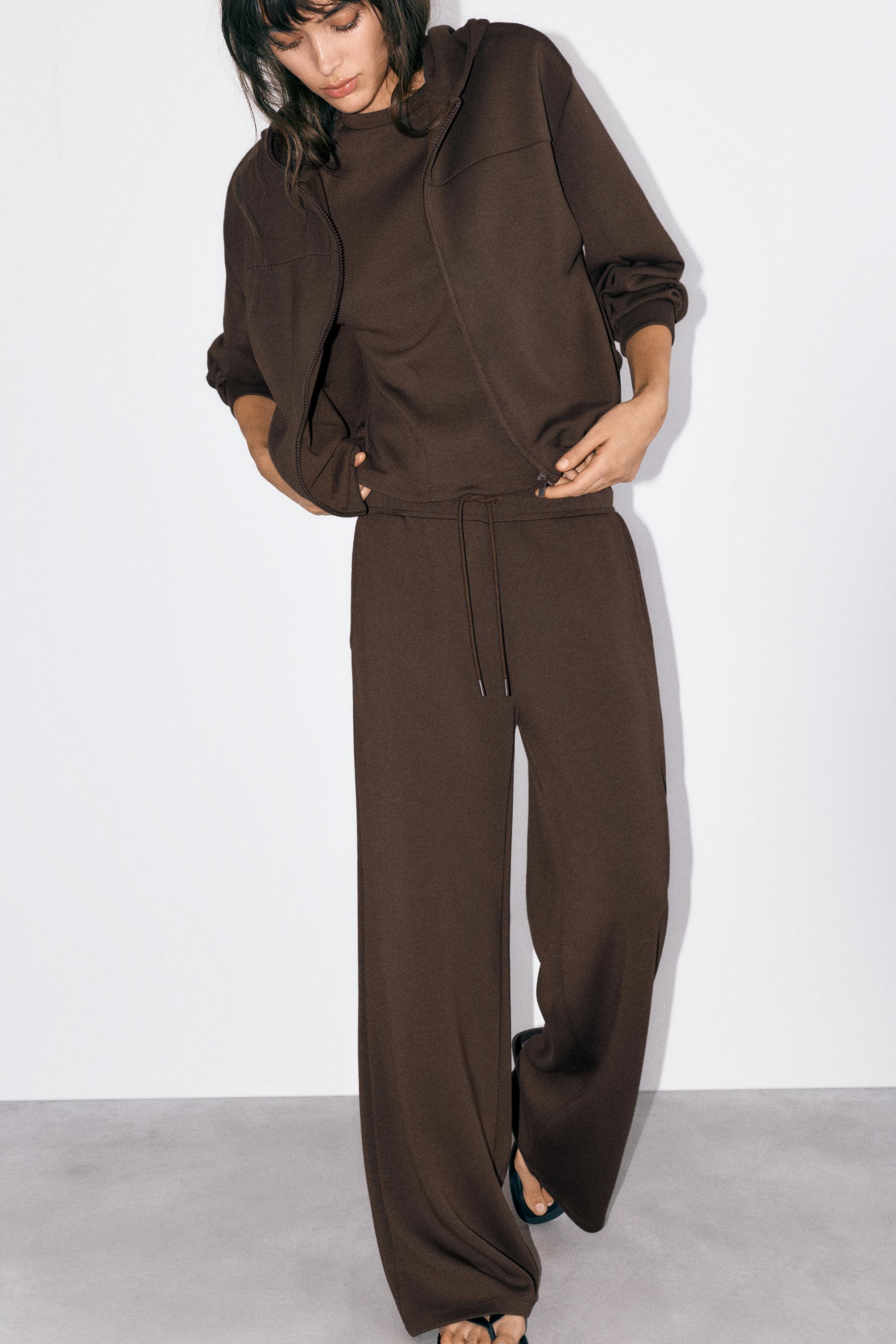 Soft-touch wide-leg trousers — Brown
