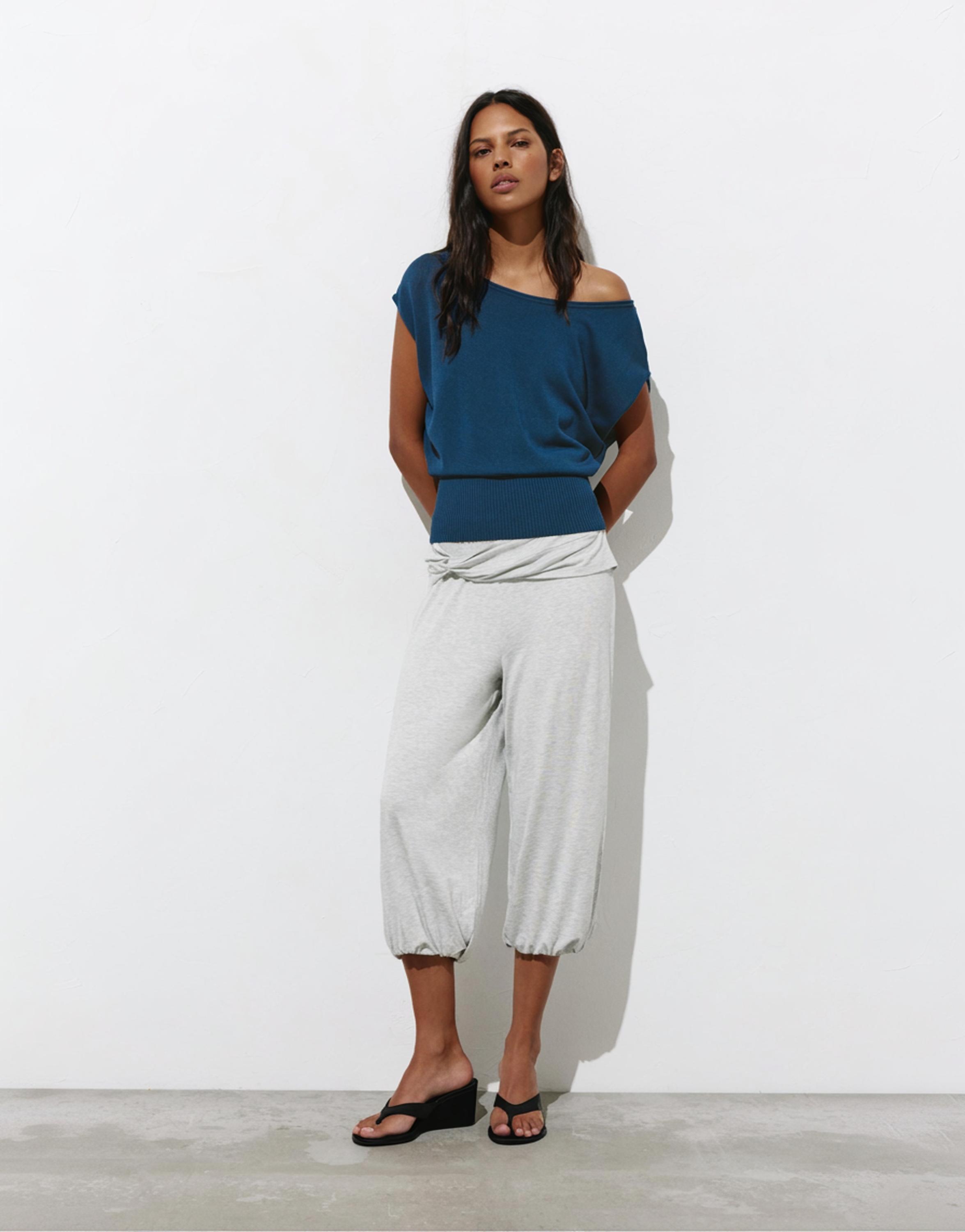 Short sleeve asymmetric knit top — Indigo