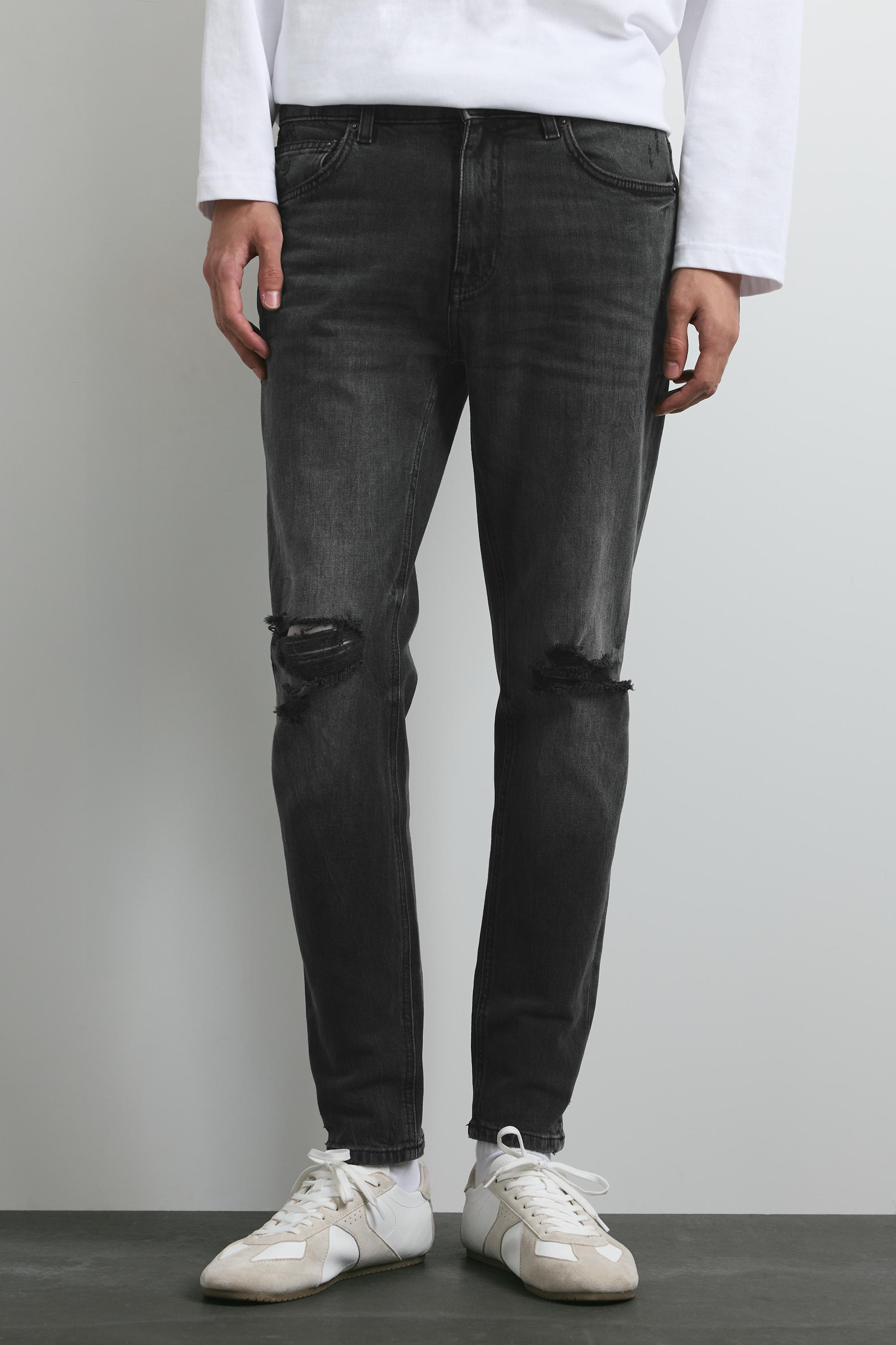 Ripped skinny jeans — Faded black