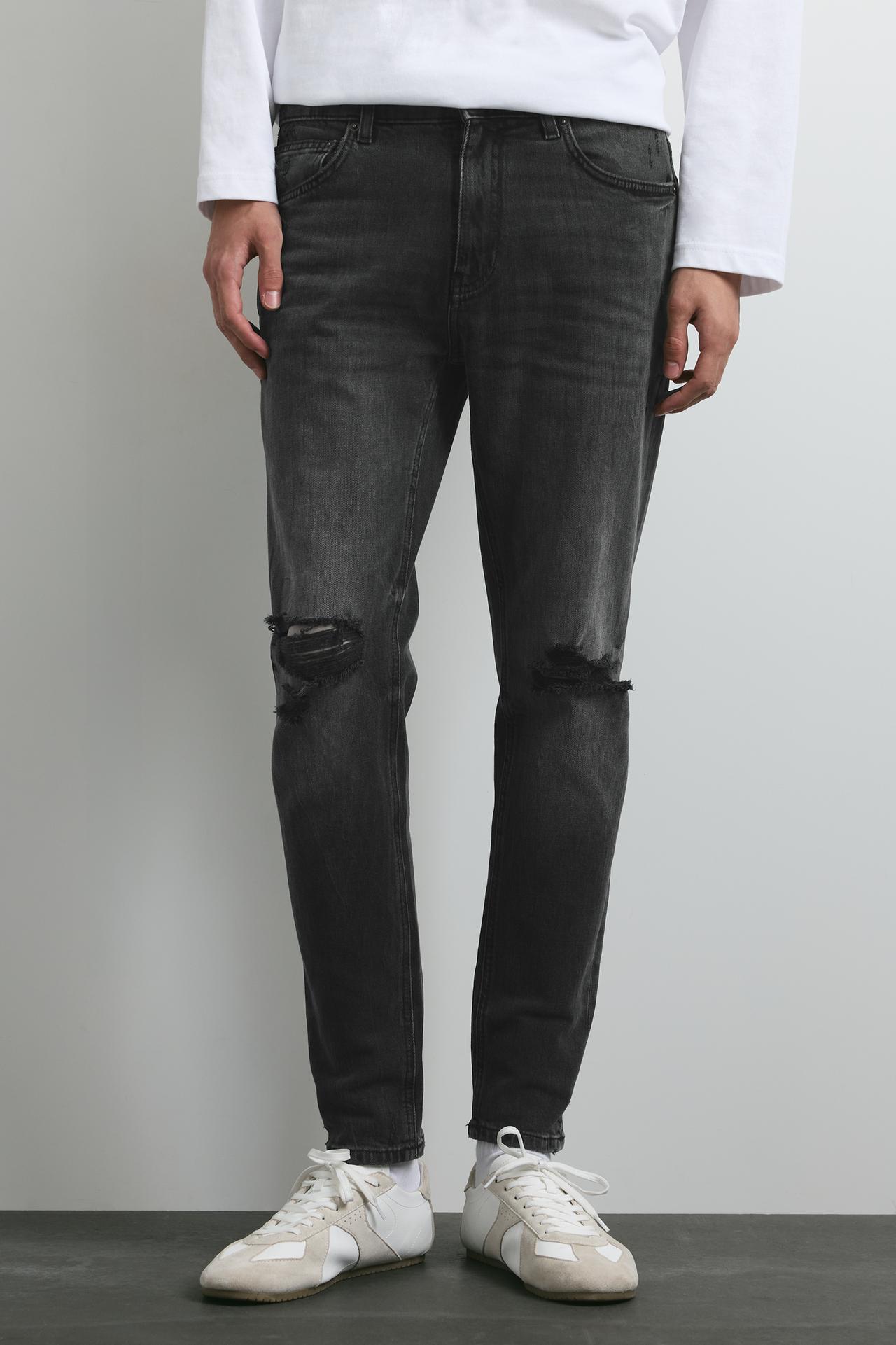 Ripped skinny jeans — Faded black