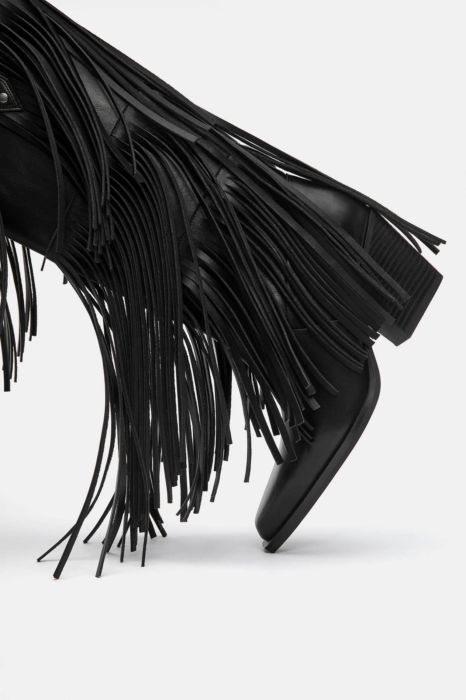 Fringed cowboy boots — Black