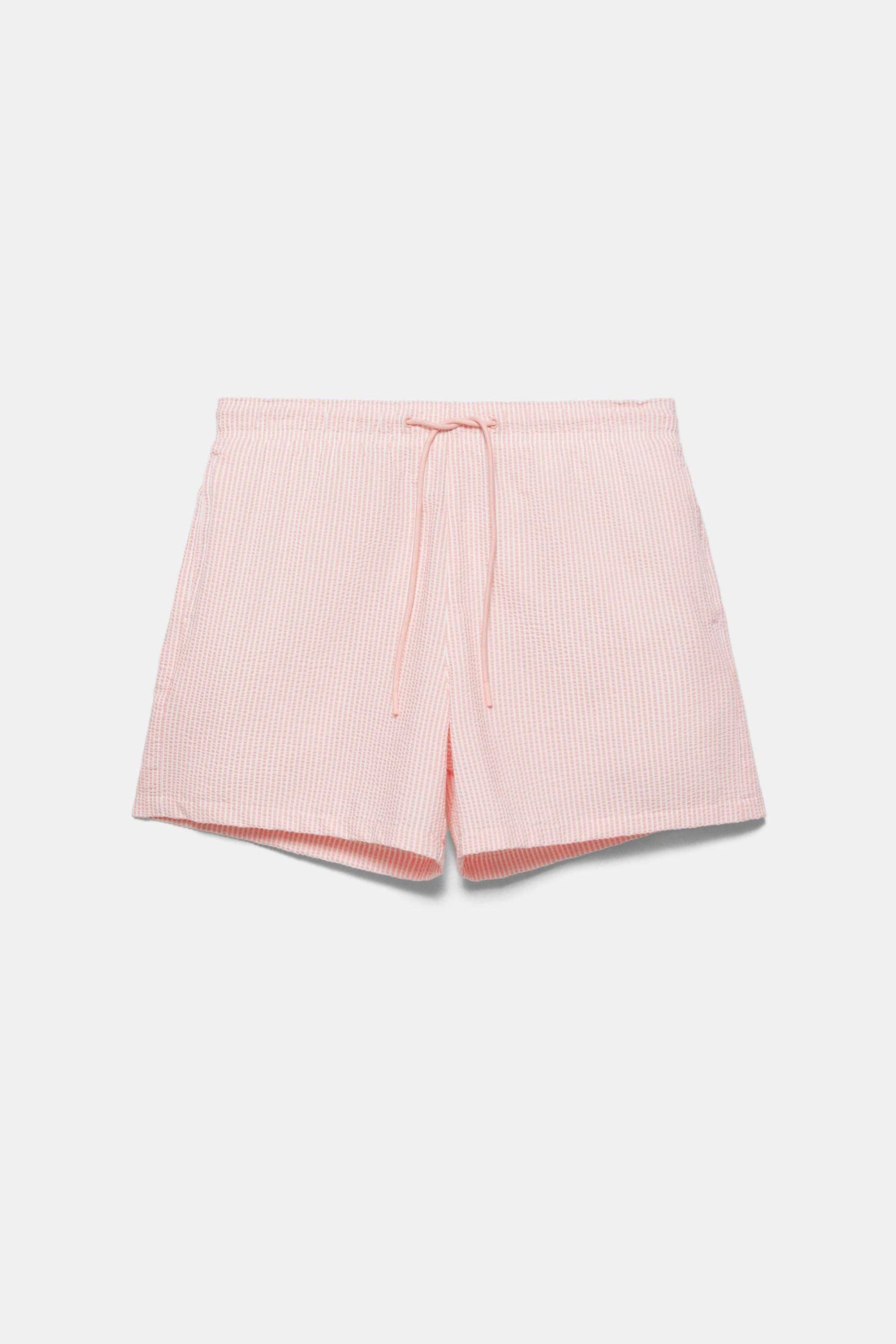 Striped seersucker swimming trunks — Pink