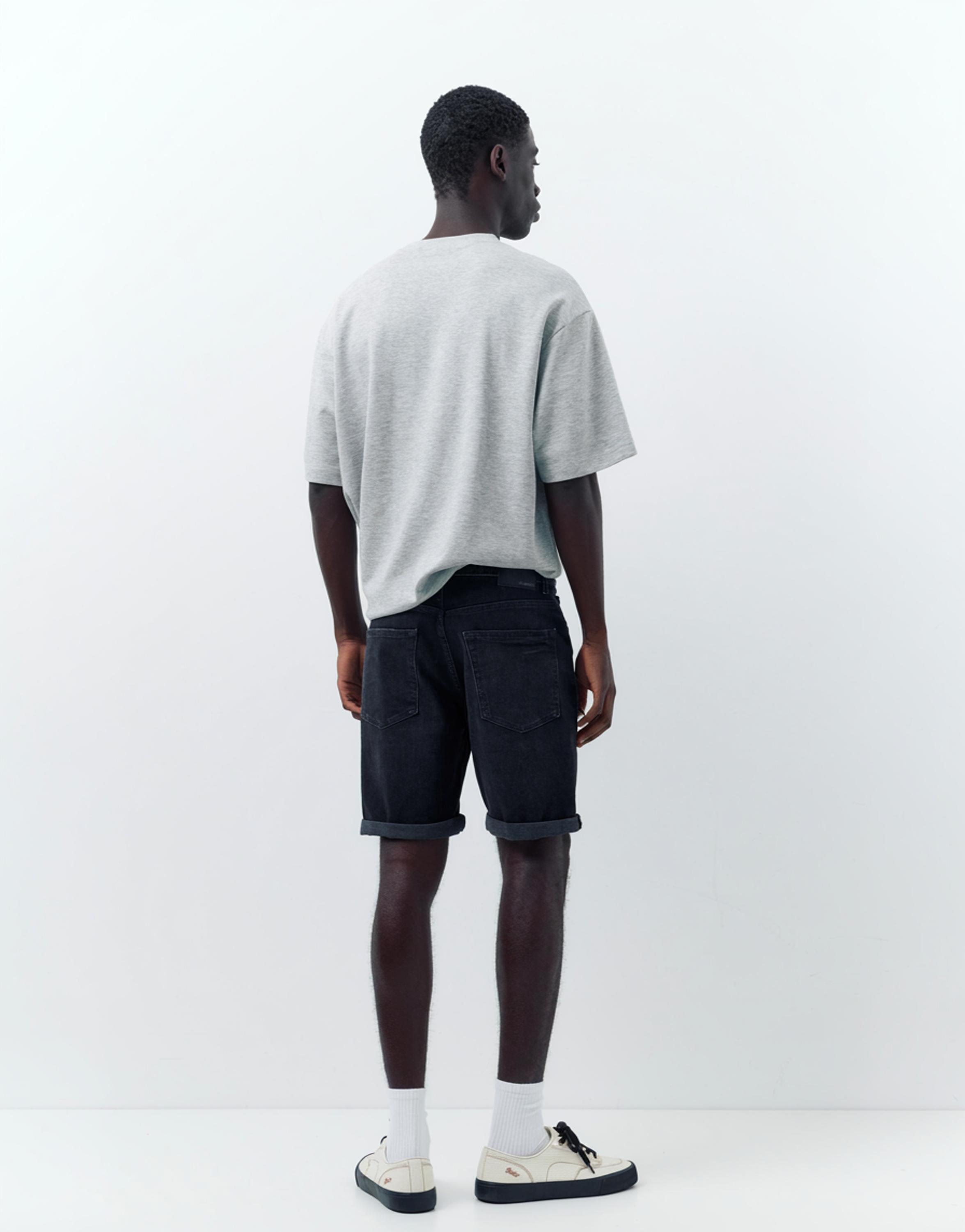 Ripped denim Bermuda shorts — Faded black