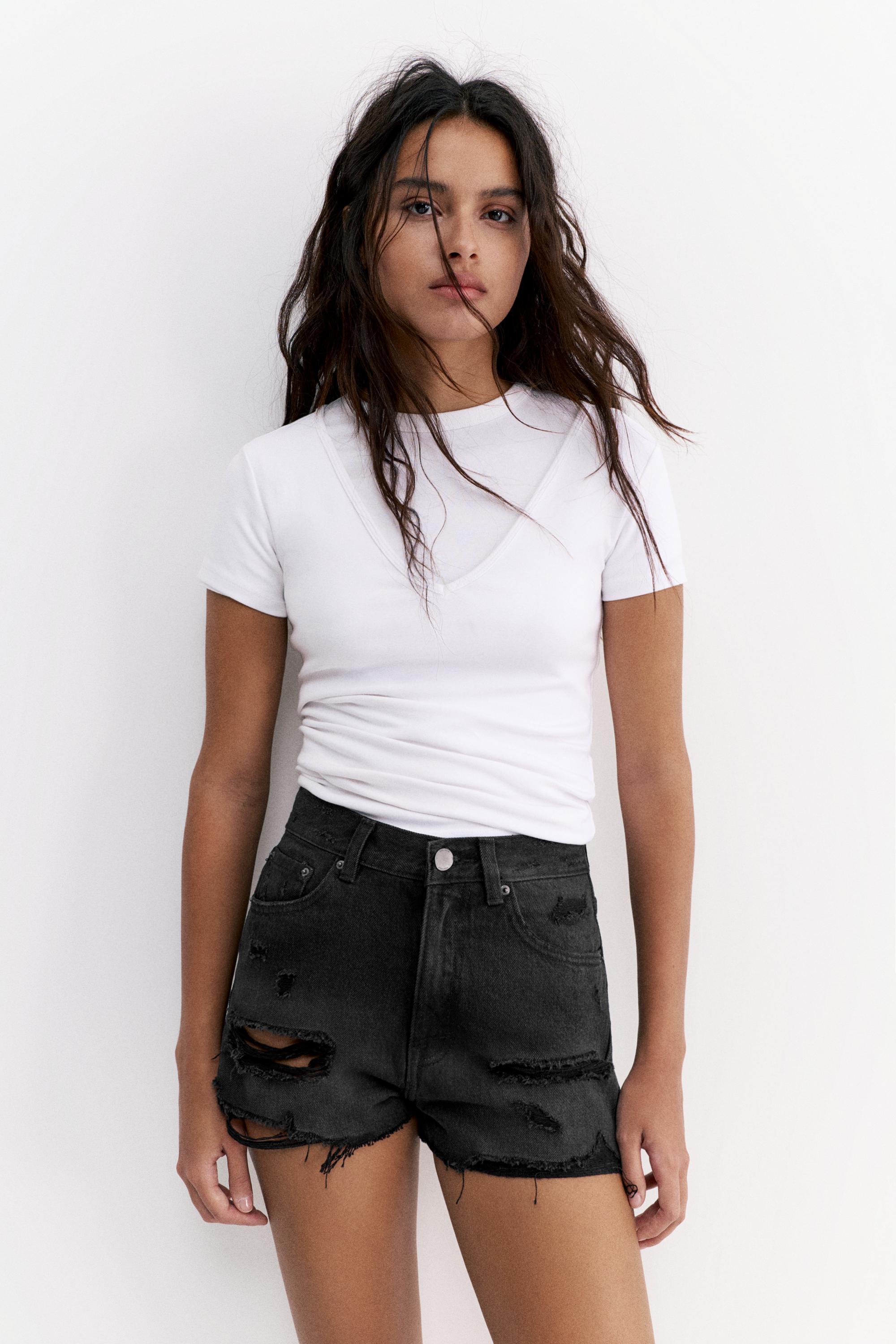 Denim shorts with frayed hems — Black