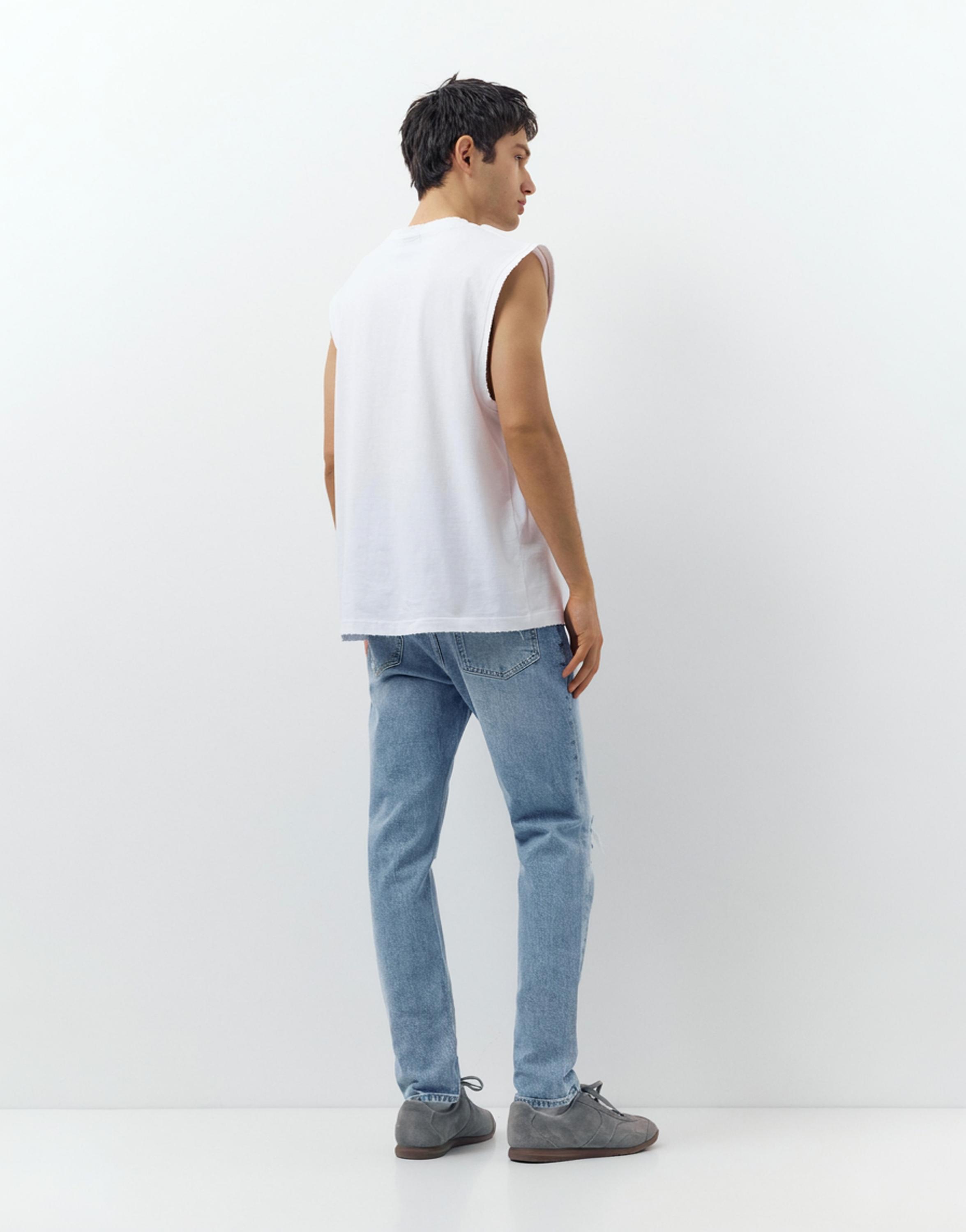 Ripped slim fit jeans — Medium blue