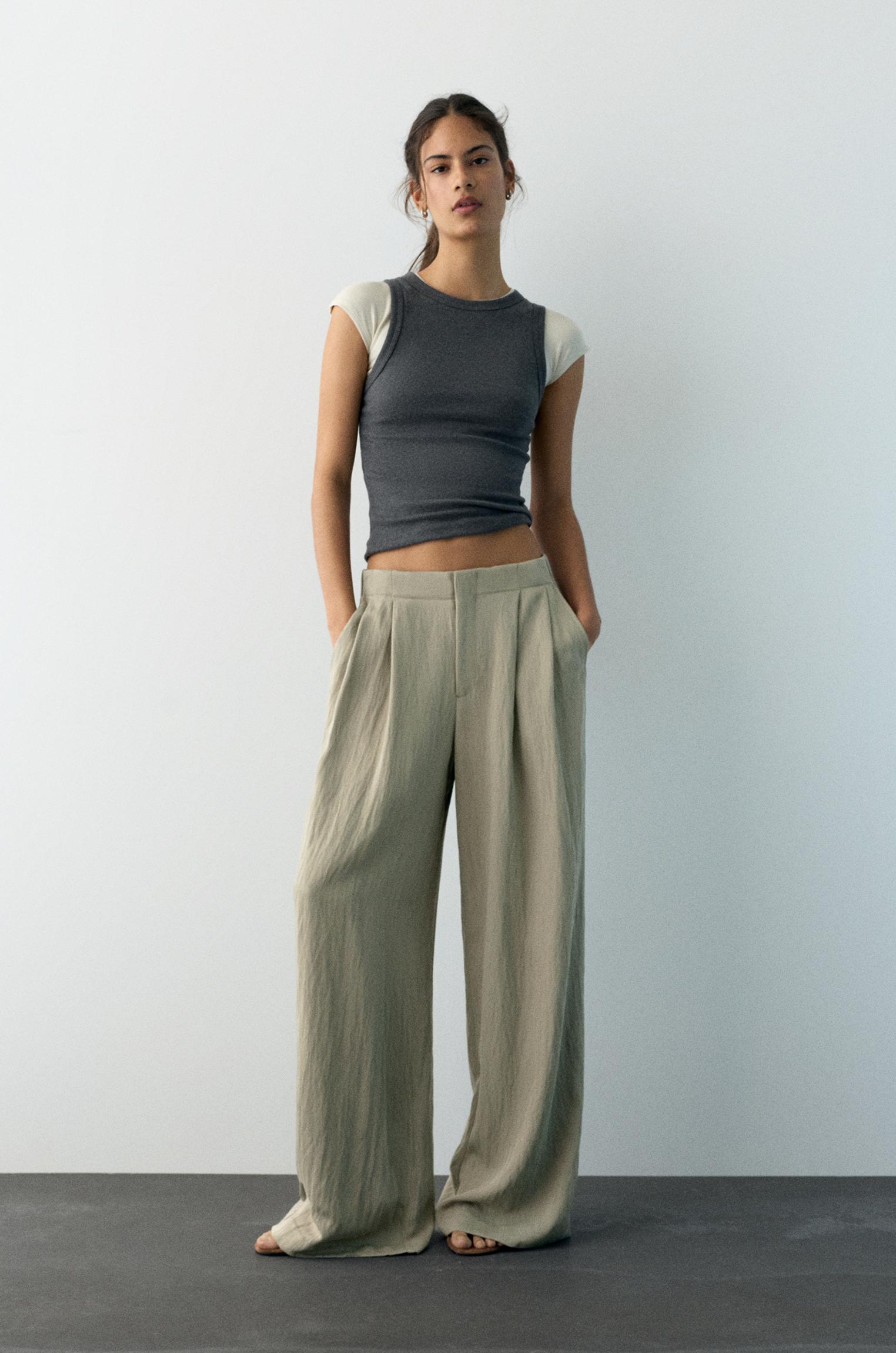 Düğmeli ve fermuarlı, kemer tokalı, önü pensli, elastik belli, tailored fit pantolon. - Görsel 47